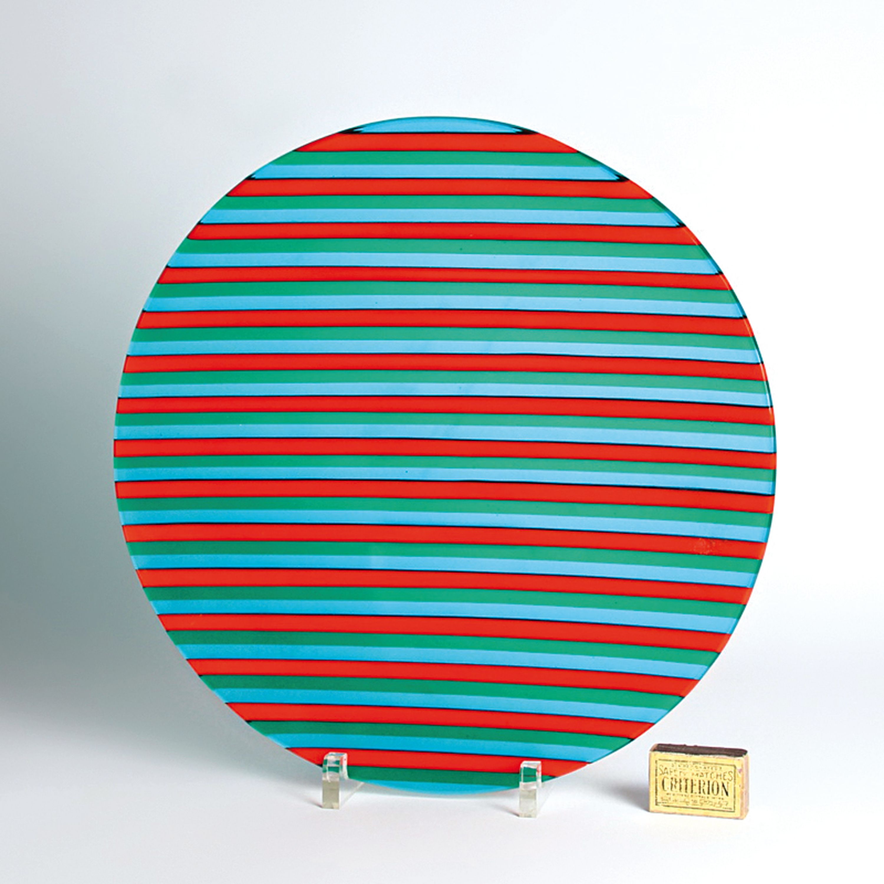 Detail g: Flache runde Schale, wohl Piero Ragazzi, Murano, aus grünen, orangefarbenen und türkisfarbenen Glasstreifen verschmolzen, H. ca. 3.5cm, D. ca. ...