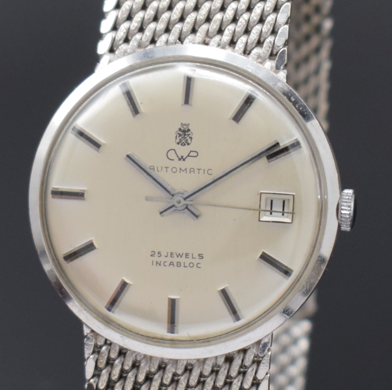 Detail a: CWP Armbanduhr in WG 585/000, Schweiz um 1965, Automatik, Boden aufgedr., silb. Zifferbl. m. Indizes, Datum b. 6, Kal. ETA 2472, 25 St., D. ca. 34 ...