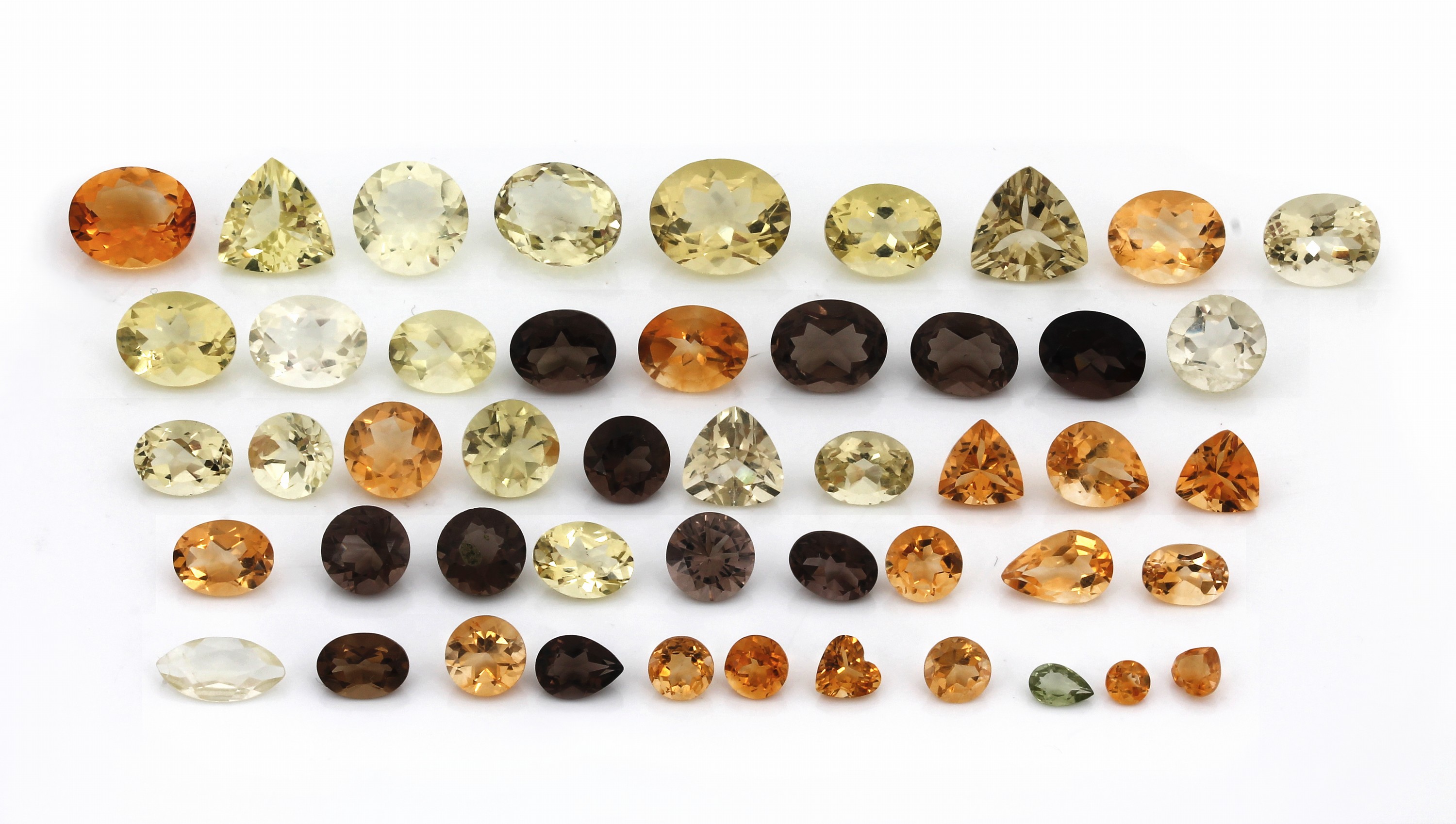 Lot lose facett. Quarze, zus. 75.60 ct, in versch. Schliffformen, Größen und Farben