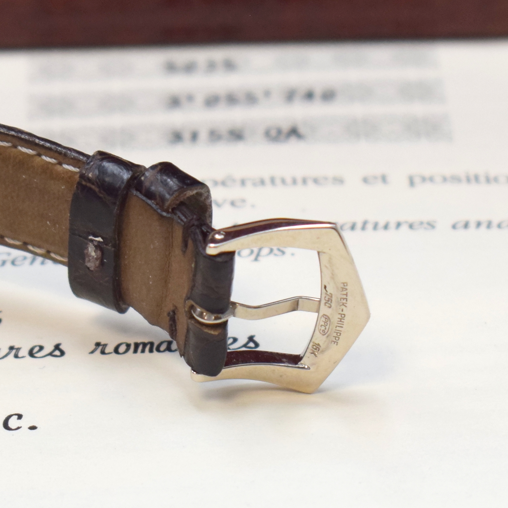 Detail b: PATEK PHILIPPE hochfeine Herrenarmbanduhr Jahreskalender in WG 750/000 Referenz 5035, Automatik, beids. vergl. Geh. inkl. orig. Lederband m. orig. WG ...