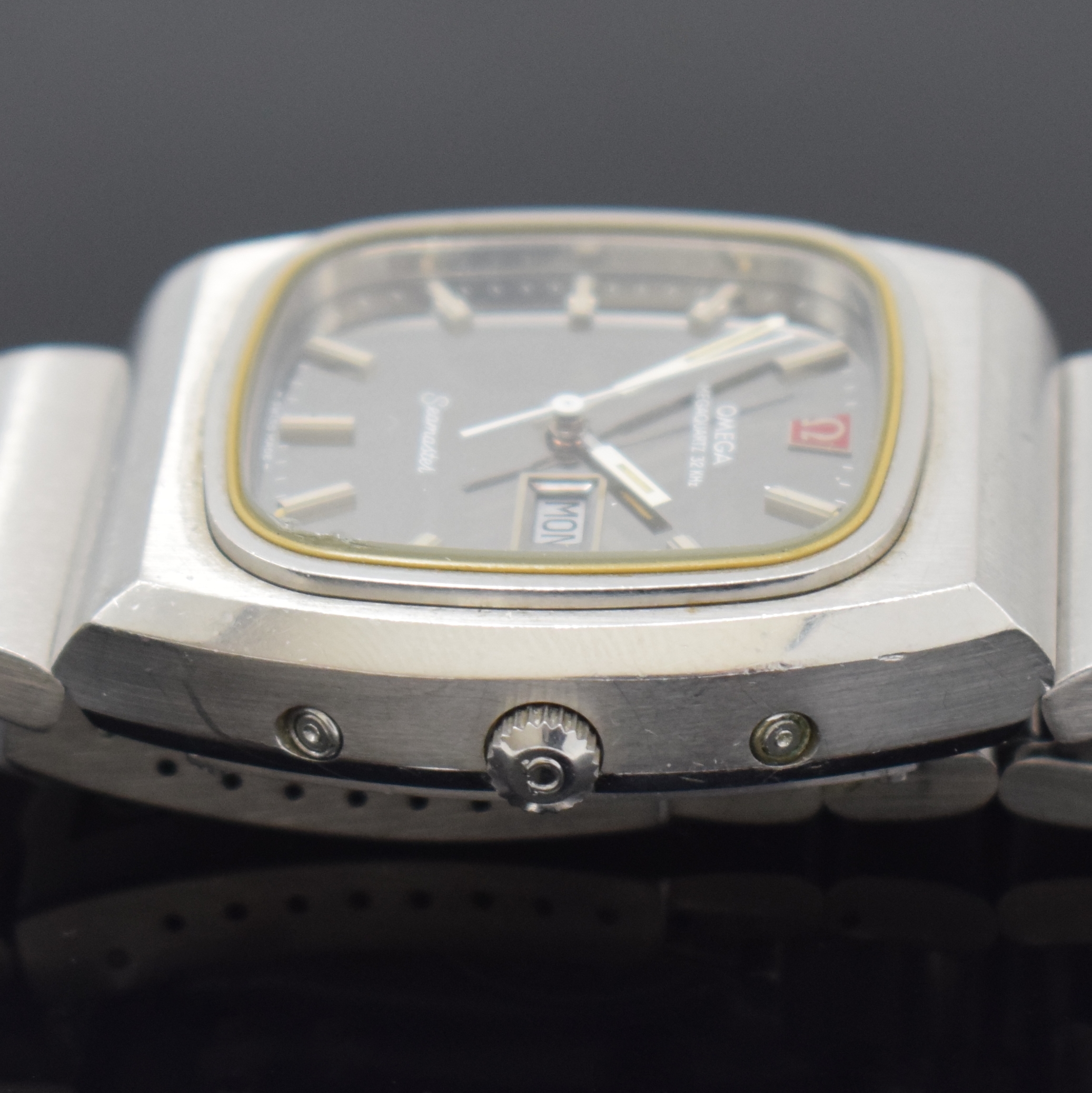 Detail c: OMEGA Megaquartz 32 KHz Herrenarmbanduhr in Stahl Referenz 196.0023, Schweiz um 1975, quarz, 4-fach verschr. Geh. inkl. orig. Gliederband m. ...