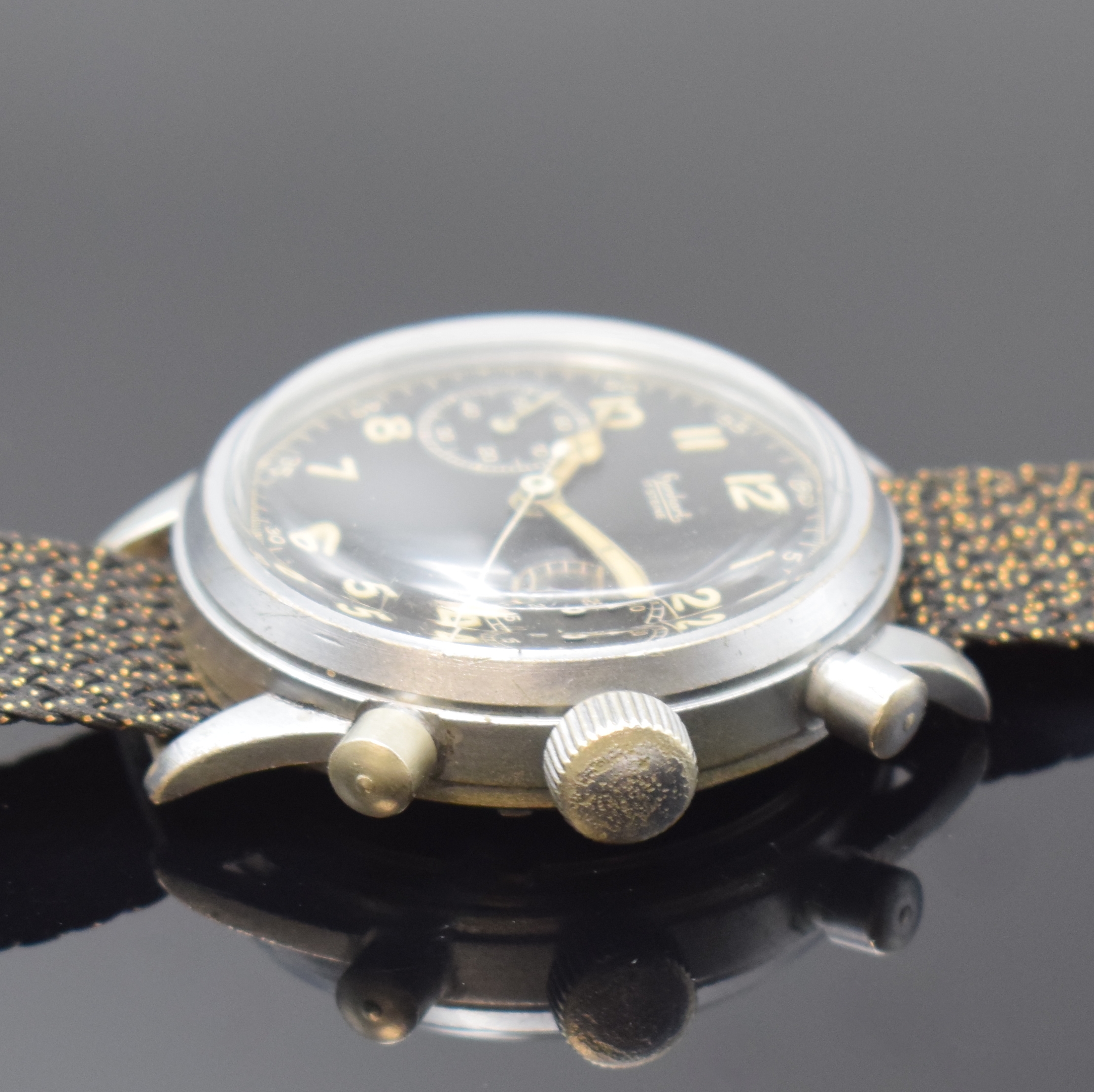 Detail b: HANHART militärische Herrenarmbanduhr mit Schaltradchronograph, Deutschland um 1940, Handaufzug, verchr. Geh., Edelstahlboden verschr., schwarzes ...