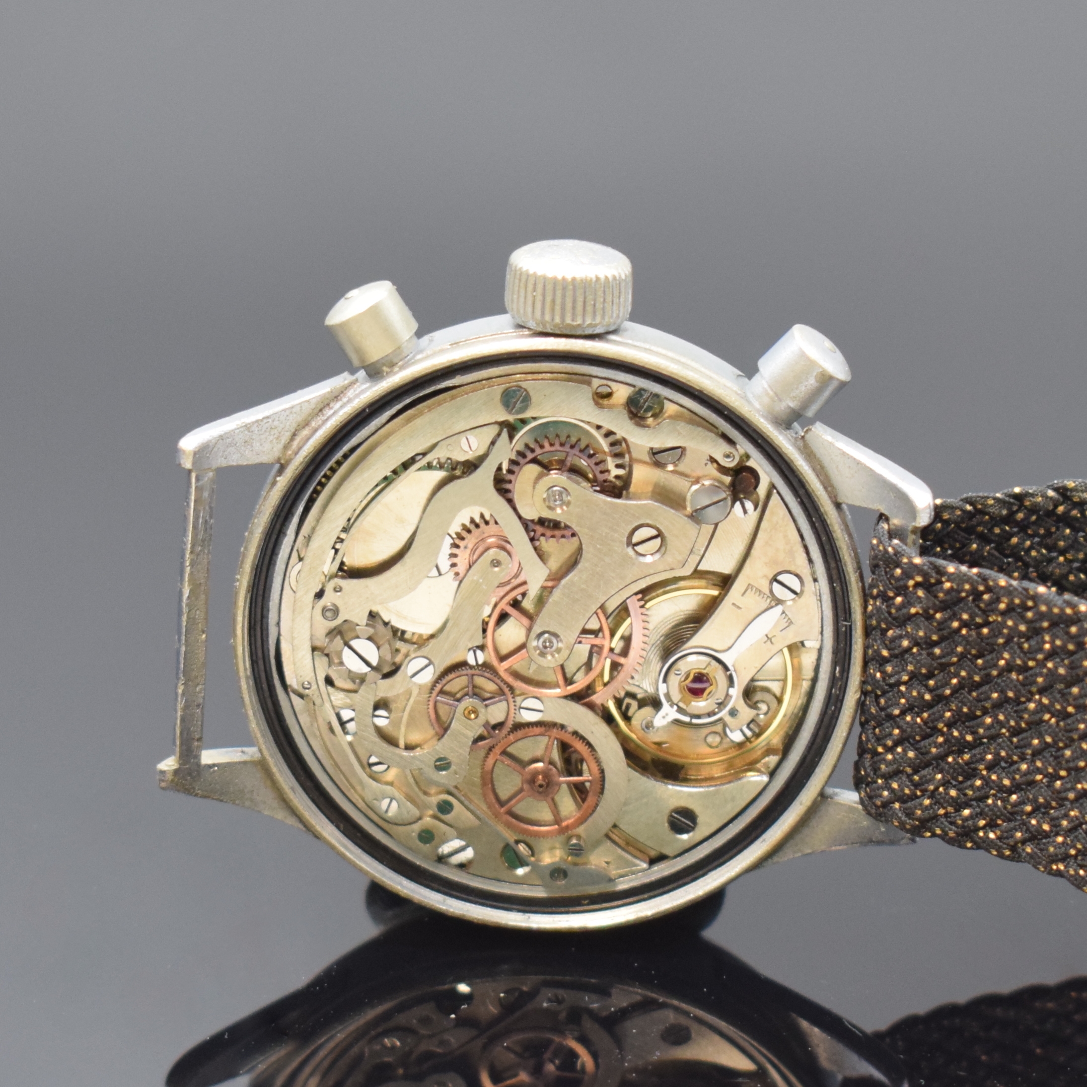 Detail d: HANHART militärische Herrenarmbanduhr mit Schaltradchronograph, Deutschland um 1940, Handaufzug, verchr. Geh., Edelstahlboden verschr., schwarzes ...