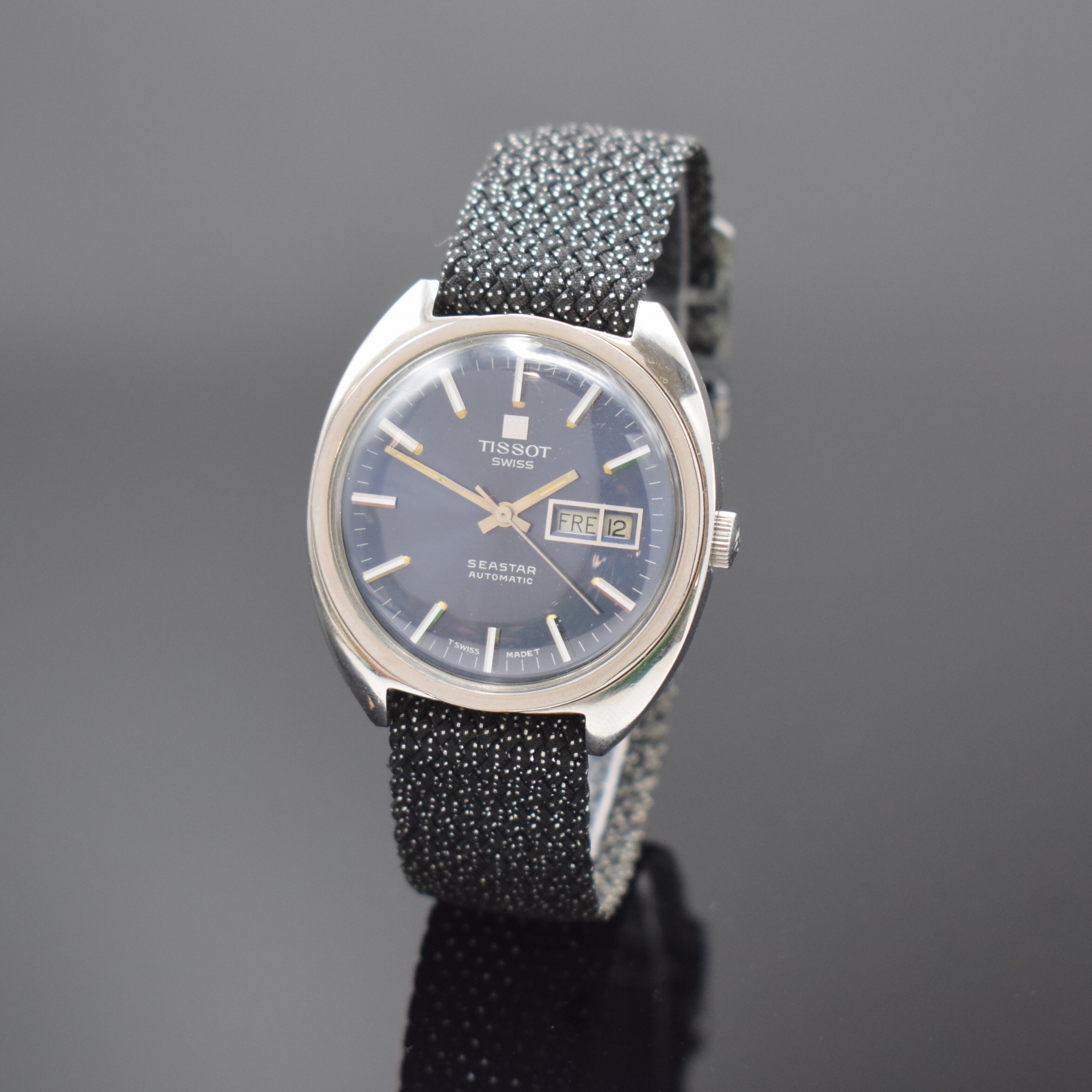 TISSOT Seastar Herrenarmbanduhr Referenz 46587-1x, Schweiz um 1970, Automatik, Edelstahl, Boden verschr., blaues Zifferbl. m. aufges. Std.-Ind., ...