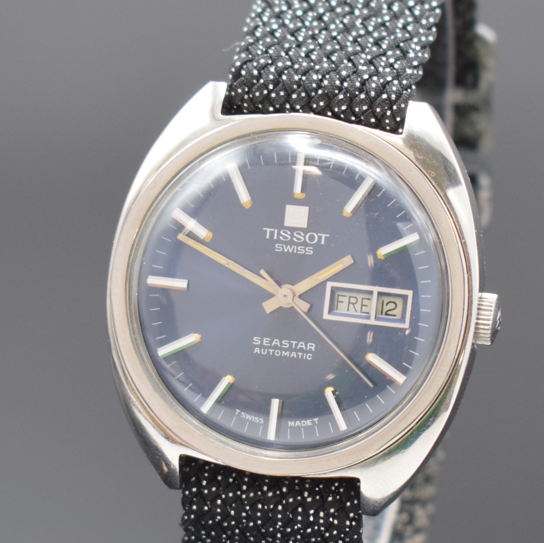 Detail a: TISSOT Seastar Herrenarmbanduhr Referenz 46587-1x, Schweiz um 1970, Automatik, Edelstahl, Boden verschr., blaues Zifferbl. m. aufges. Std.-Ind., ...