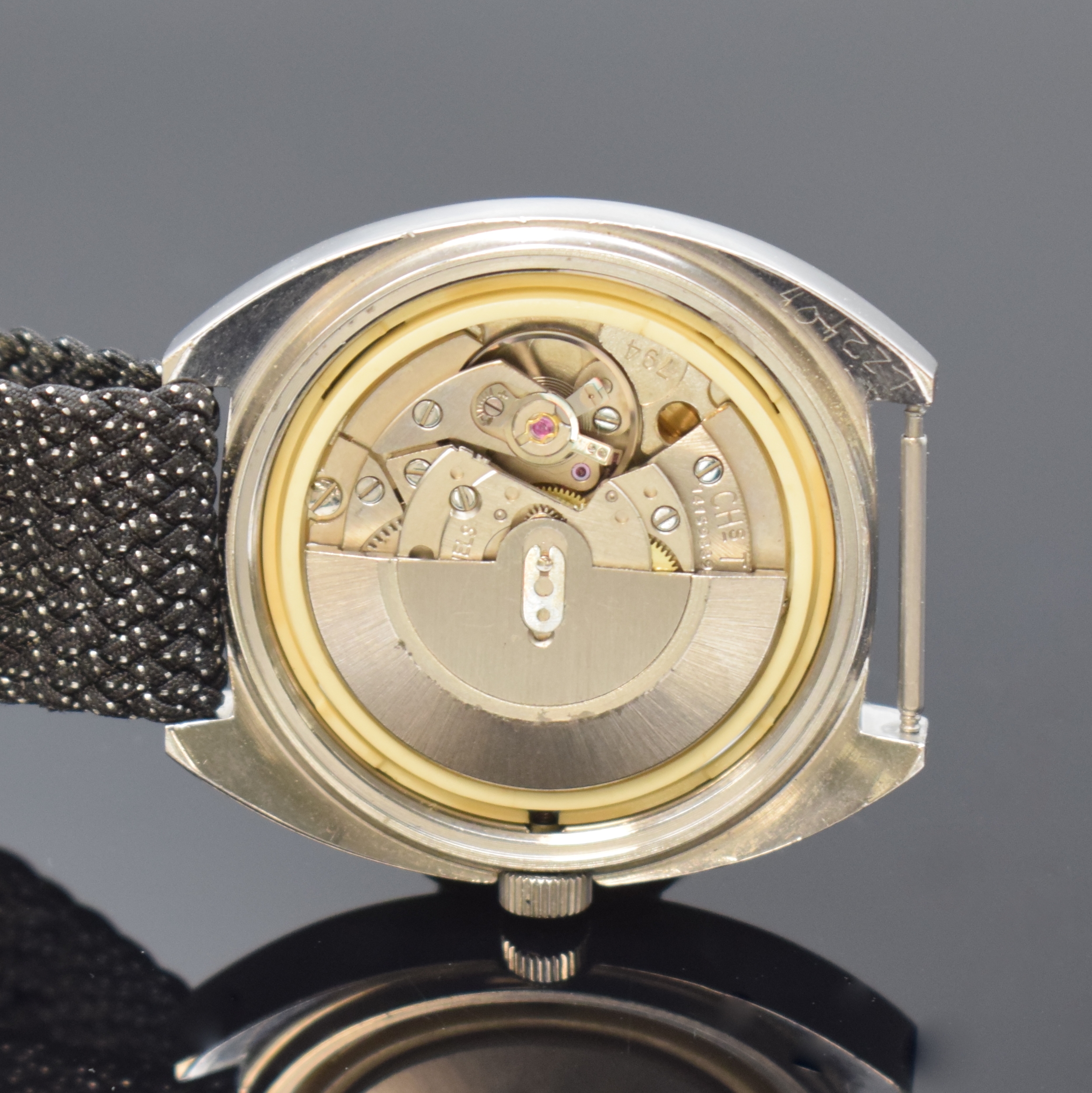Detail e: TISSOT Seastar Herrenarmbanduhr Referenz 46587-1x, Schweiz um 1970, Automatik, Edelstahl, Boden verschr., blaues Zifferbl. m. aufges. Std.-Ind., ...