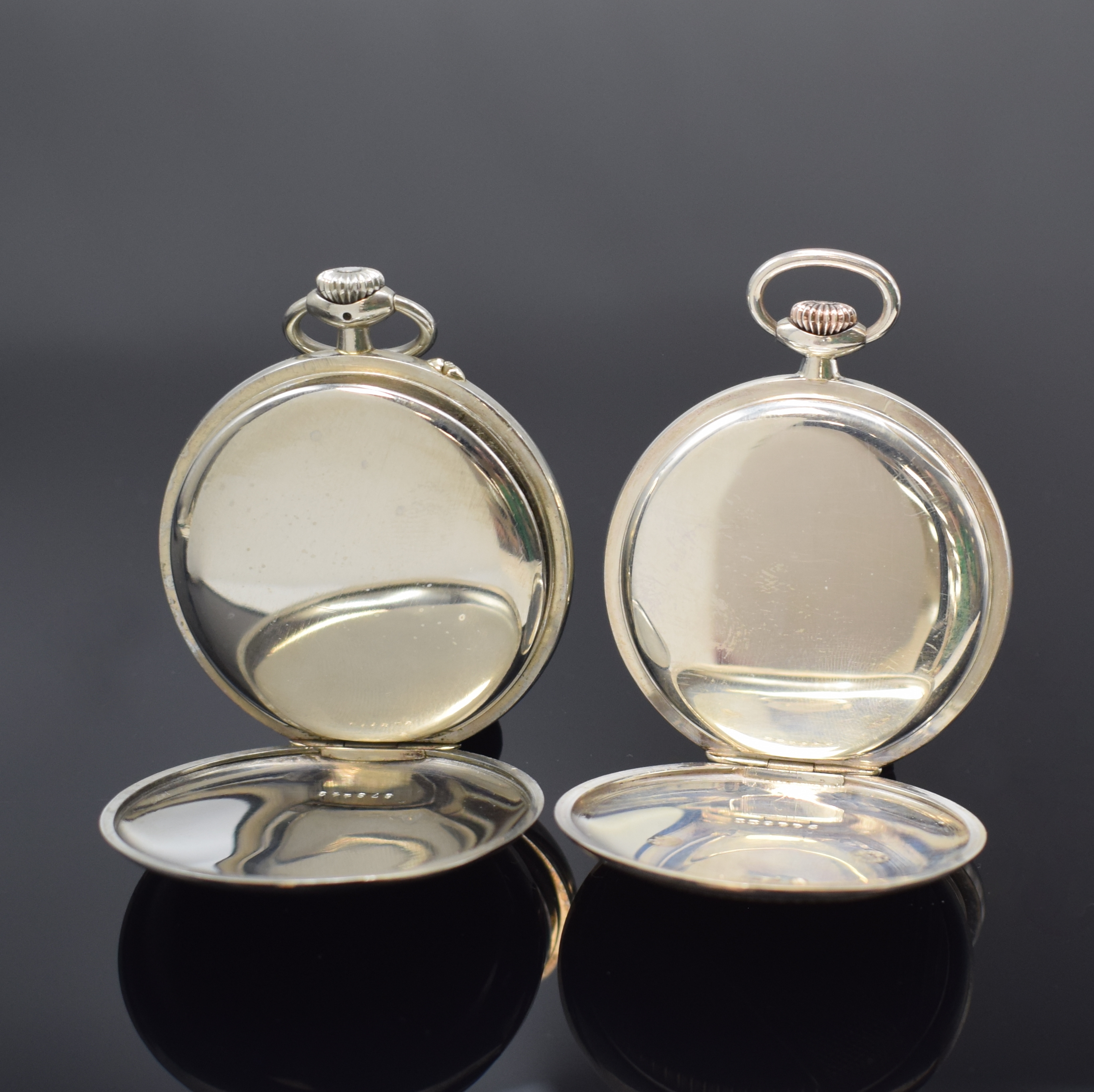 Detail c: IWC 2 offene Taschenuhren in Silber und Nickel, Schweiz um 1925/1930, 1x wohl Uhrmacherschule, Emailzifferblätter m. arab. Zahlen, gebl. u. gold. ...