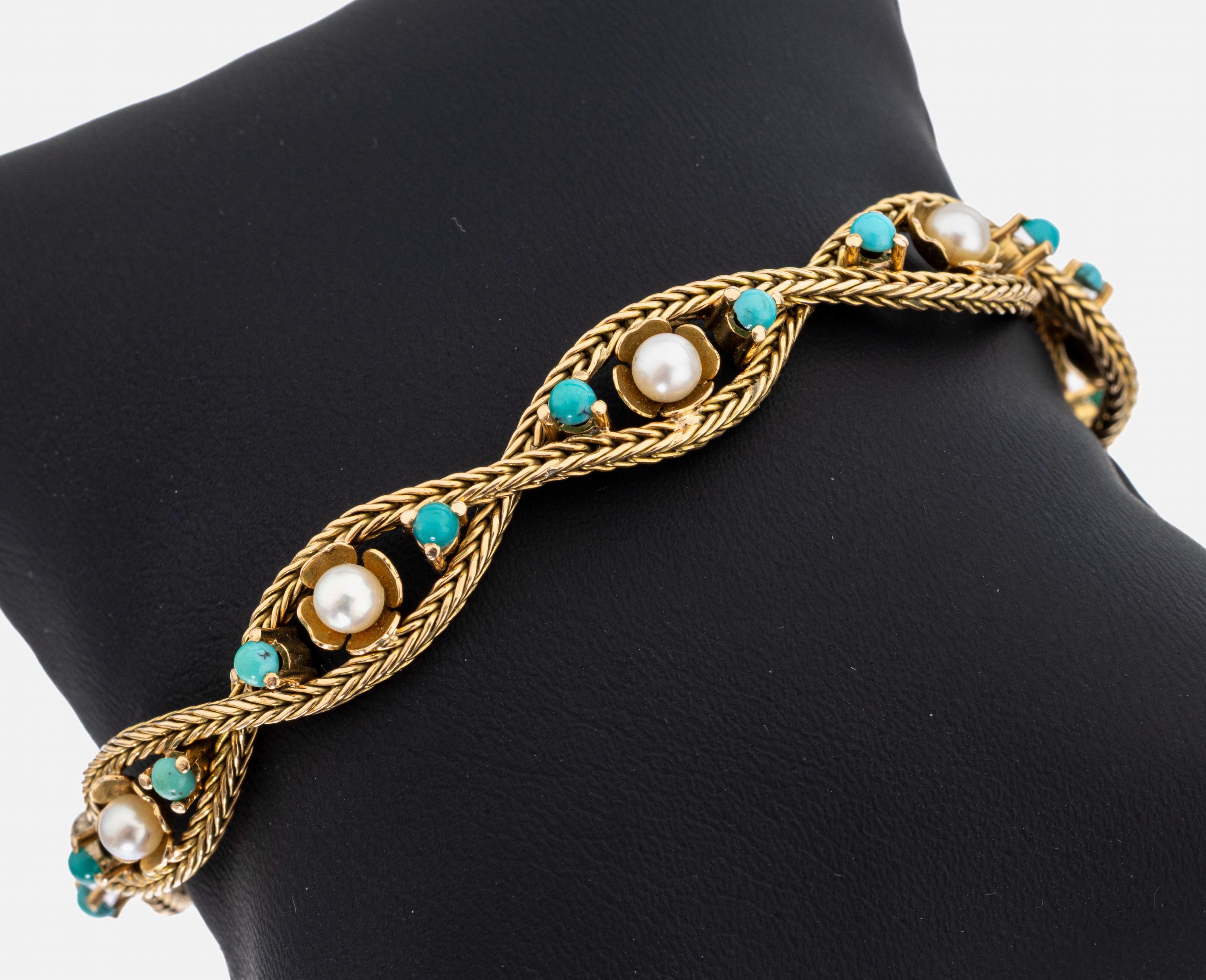 18 kt Gold Perl-Türkis-Armband, GG 750/000 gepr., 8 kl. Akoyazuchtperlen, D. ca. 3.9 mm, 16 kl. Türkis-Cabochons, L. ca. 19 cm, Kastenschloss mit ...