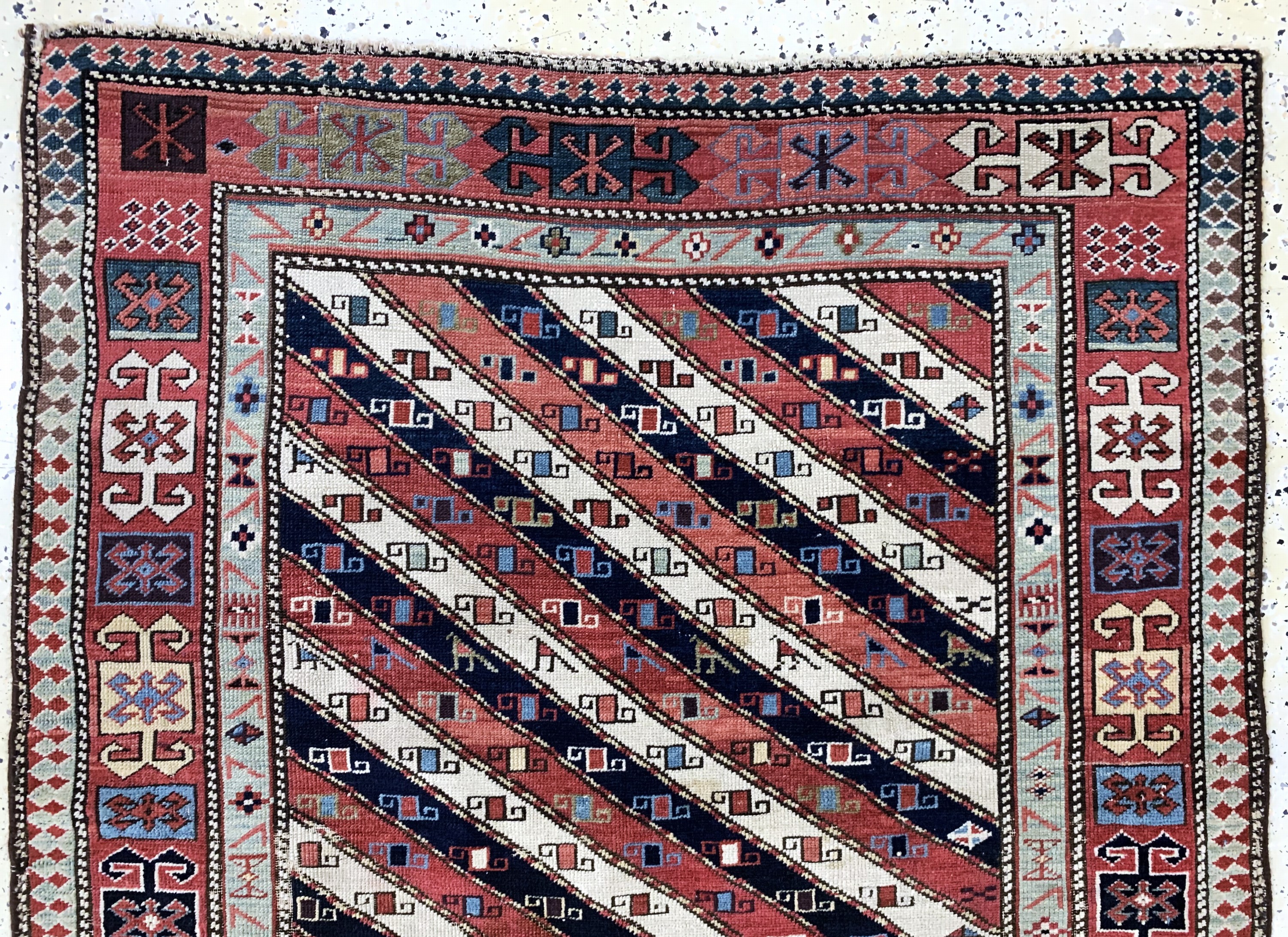 Detail a: "Gendje"Kazak antik, Kaukasus, 19.Jhd, Wolle auf Wolle, ca. 245 x 112 cm, EHZ: 2-3, (kleine restaurierungen)