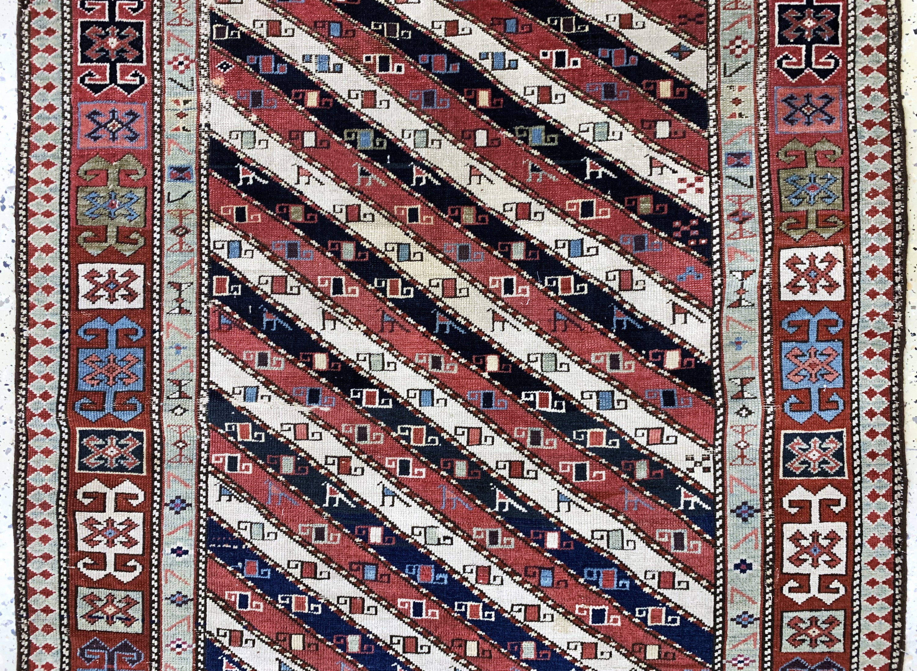 Detail b: "Gendje"Kazak antik, Kaukasus, 19.Jhd, Wolle auf Wolle, ca. 245 x 112 cm, EHZ: 2-3, (kleine restaurierungen)