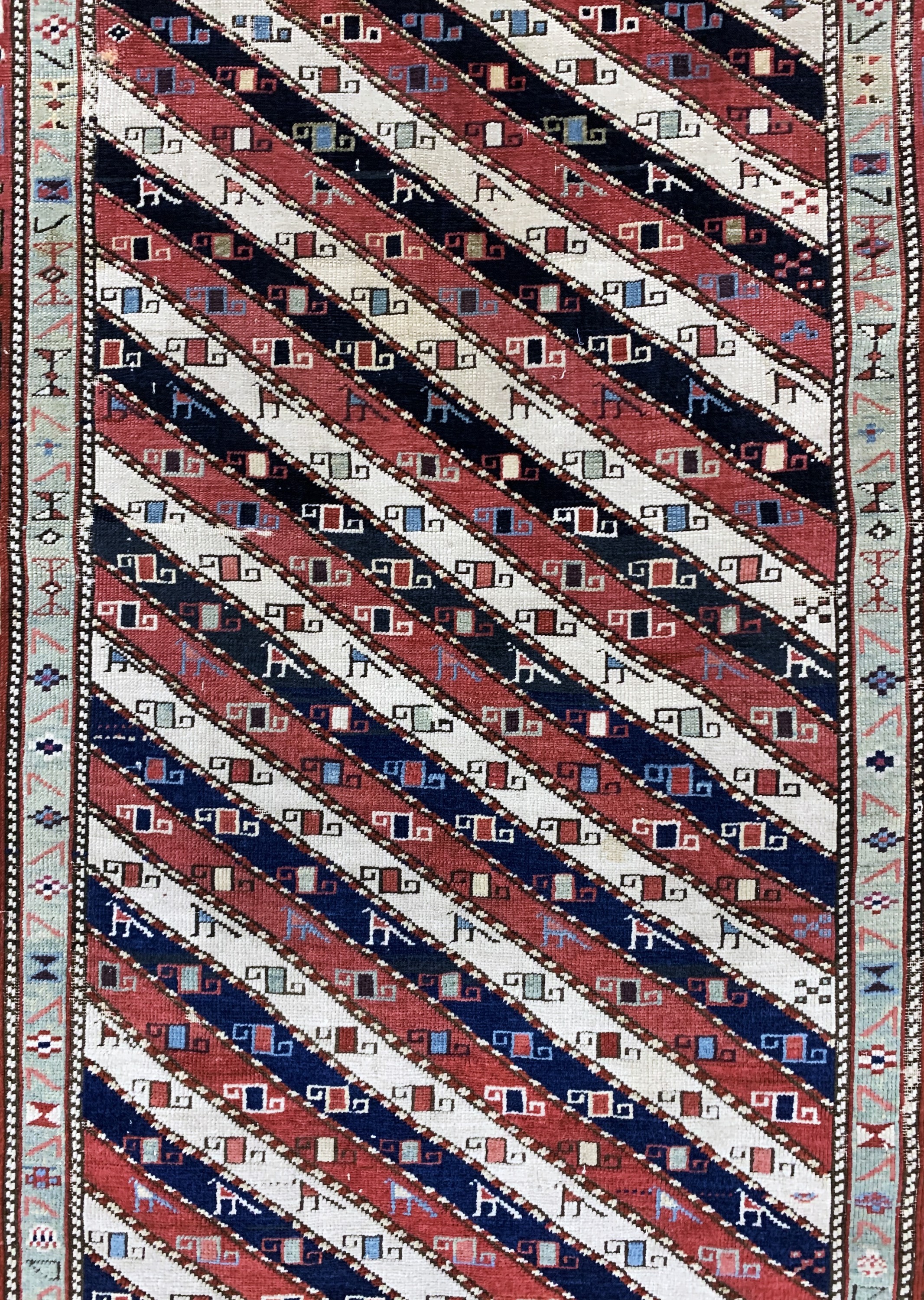 Detail d: "Gendje"Kazak antik, Kaukasus, 19.Jhd, Wolle auf Wolle, ca. 245 x 112 cm, EHZ: 2-3, (kleine restaurierungen)