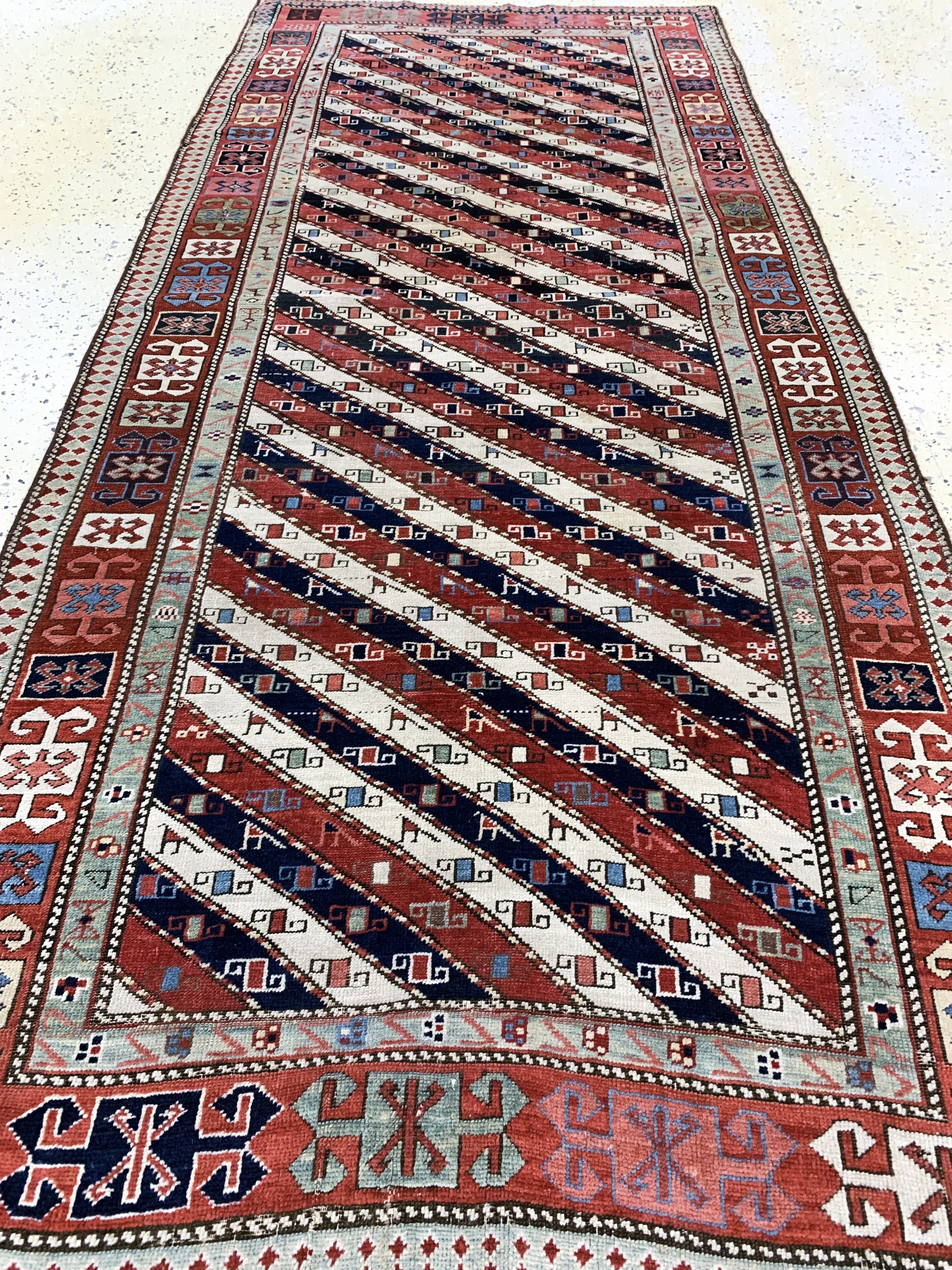 Detail e: "Gendje"Kazak antik, Kaukasus, 19.Jhd, Wolle auf Wolle, ca. 245 x 112 cm, EHZ: 2-3, (kleine restaurierungen)