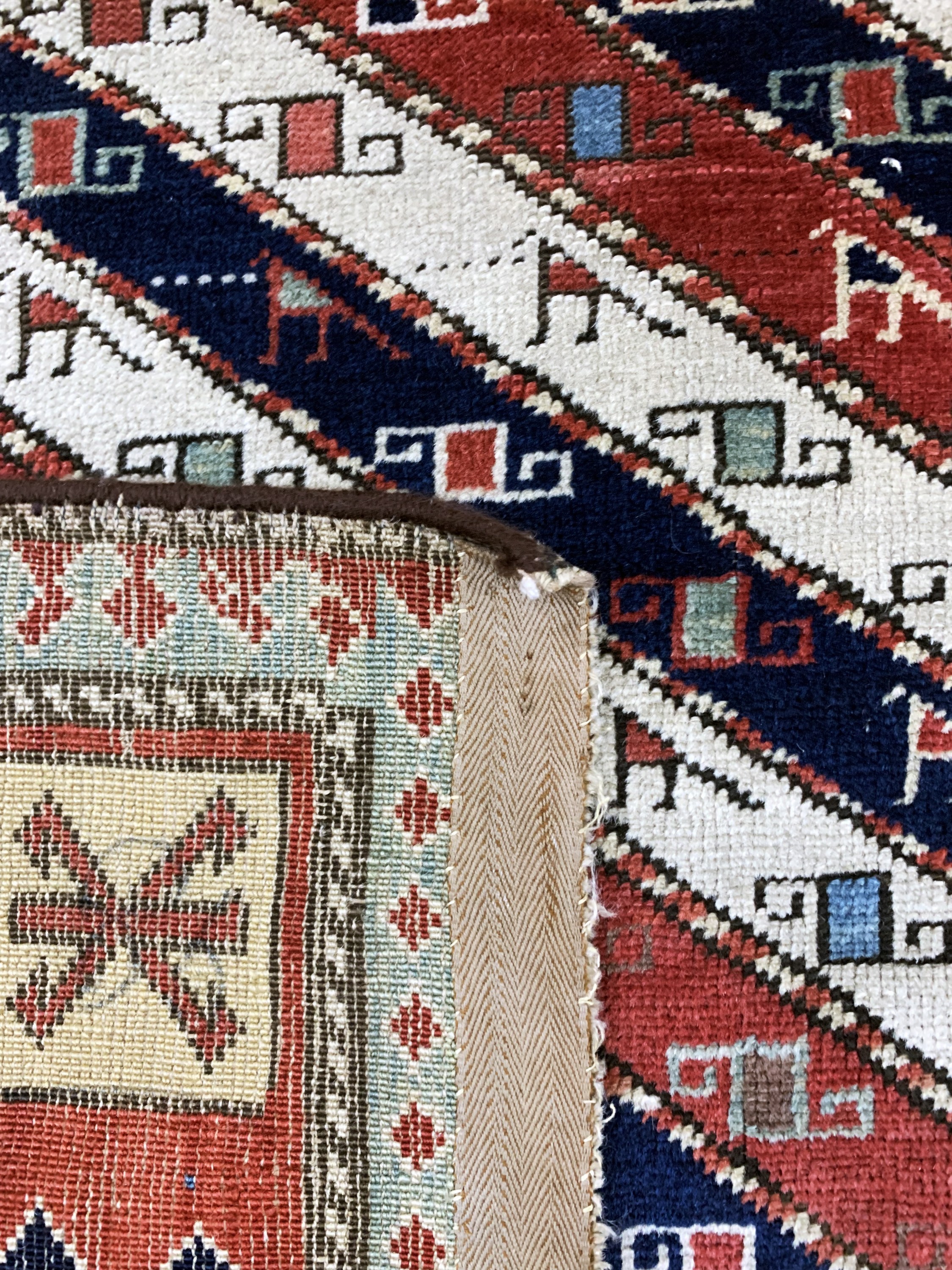 Detail f: "Gendje"Kazak antik, Kaukasus, 19.Jhd, Wolle auf Wolle, ca. 245 x 112 cm, EHZ: 2-3, (kleine restaurierungen)