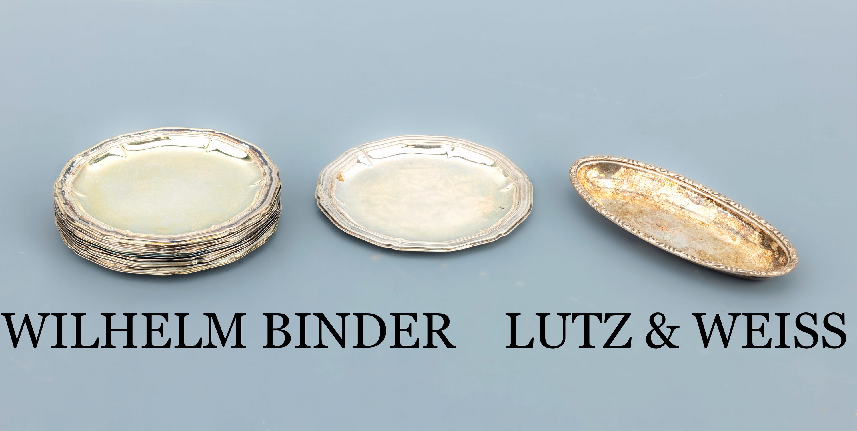 Set 12 Untersetzer, 835er Silber, schlichtezeitlose Form, D. ca. 10 cm, Hersteller WILHELM BINDER, dazu 1 kl. ovale Anbietschale mit floralem Rand, ...
