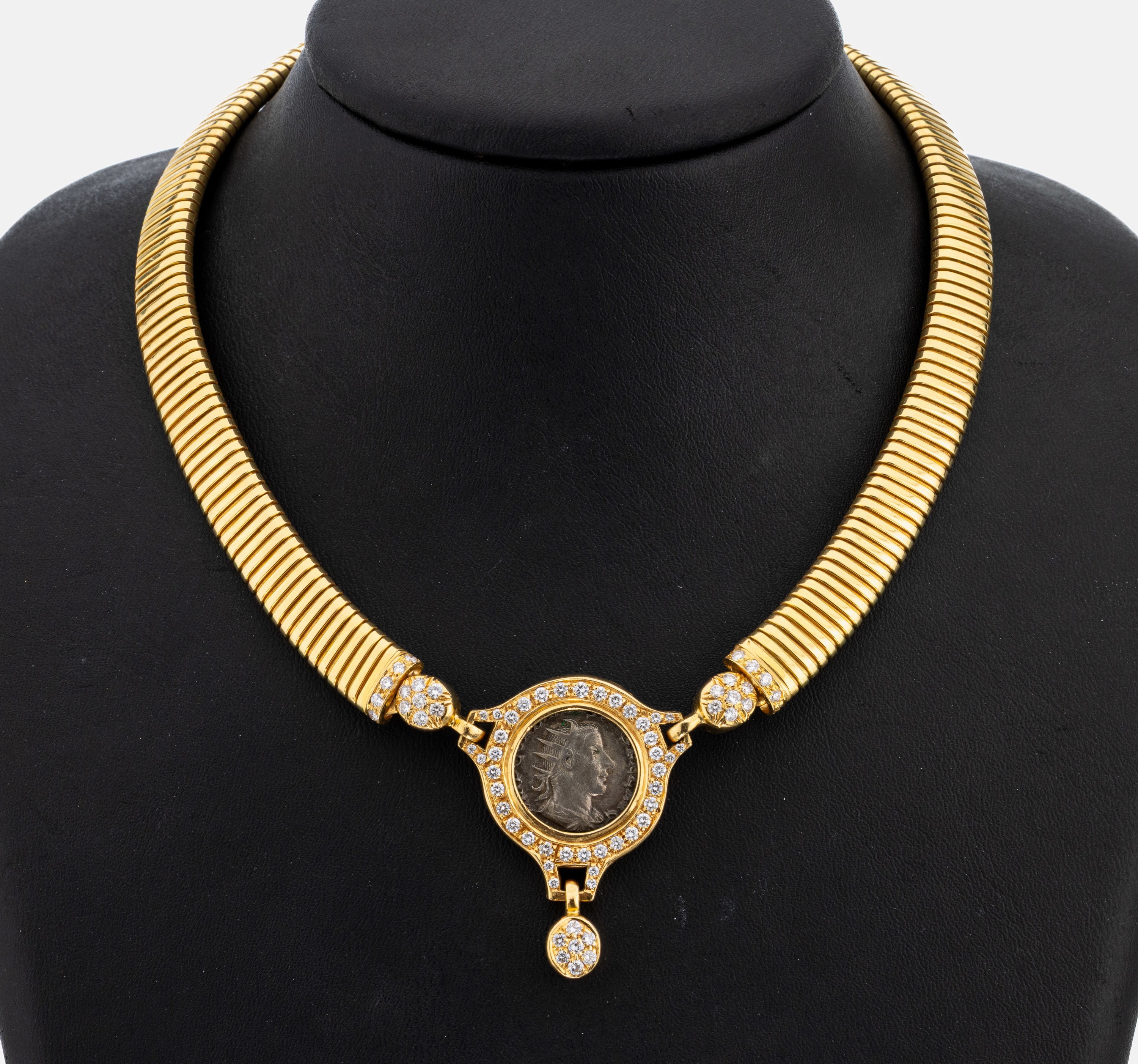 18 kt Gold Brillant-Collier, GG 750/000, Mittelteil mit eingelegter antiker Münze, 71 Brillanten zus. ca. 1.42 ct feines Weiß -Weiß/vs-si, L. ca. ...
