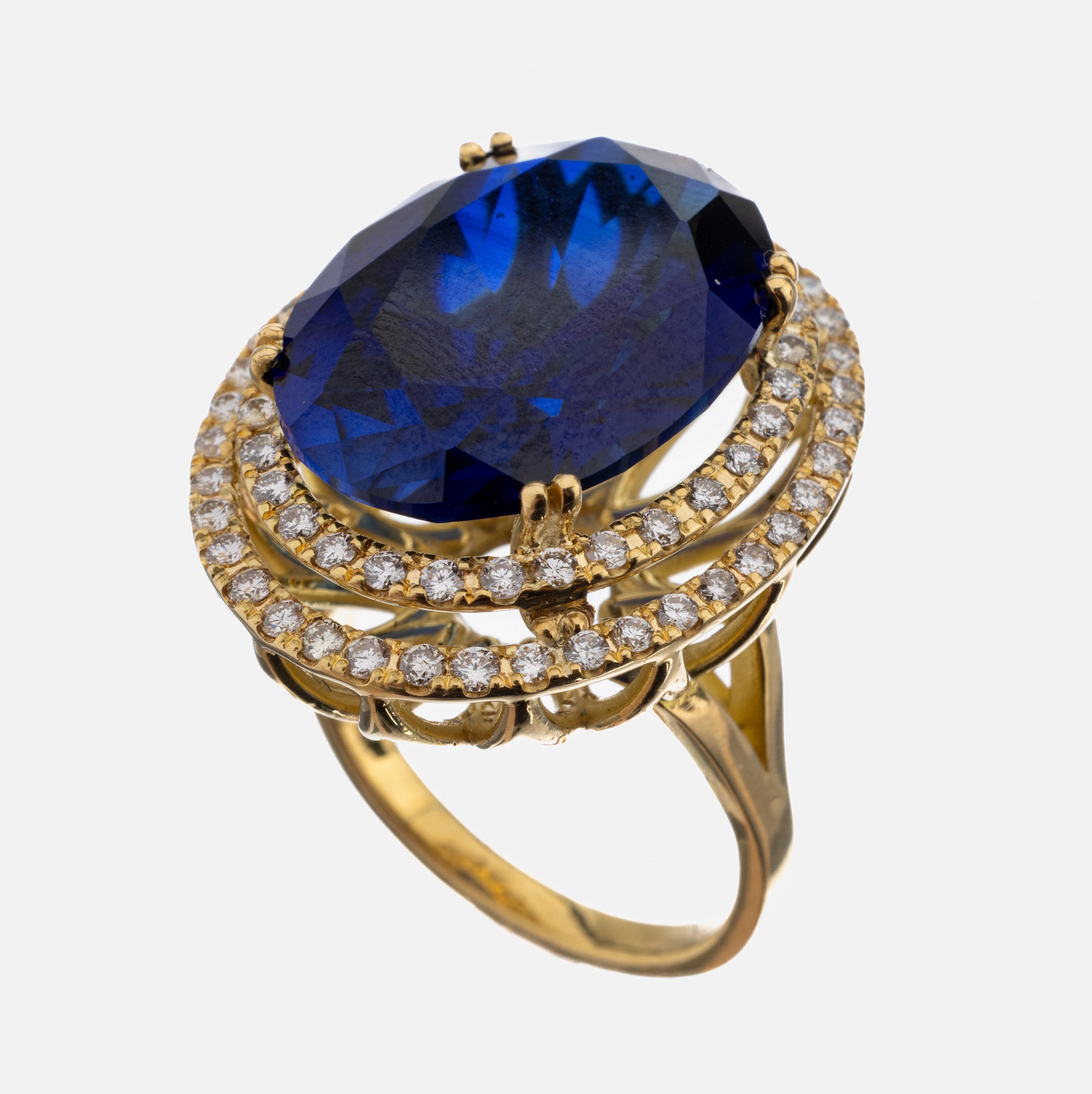 18 kt Gold Saphir-Brillant-Ring, GG 750/000, ovalfacett. Saphir (beh.) ca. 20.50 ct, 69 Brillanten zus. ca. 1.30 ct Weiß/vs, ca. 16.9 g, RW 55