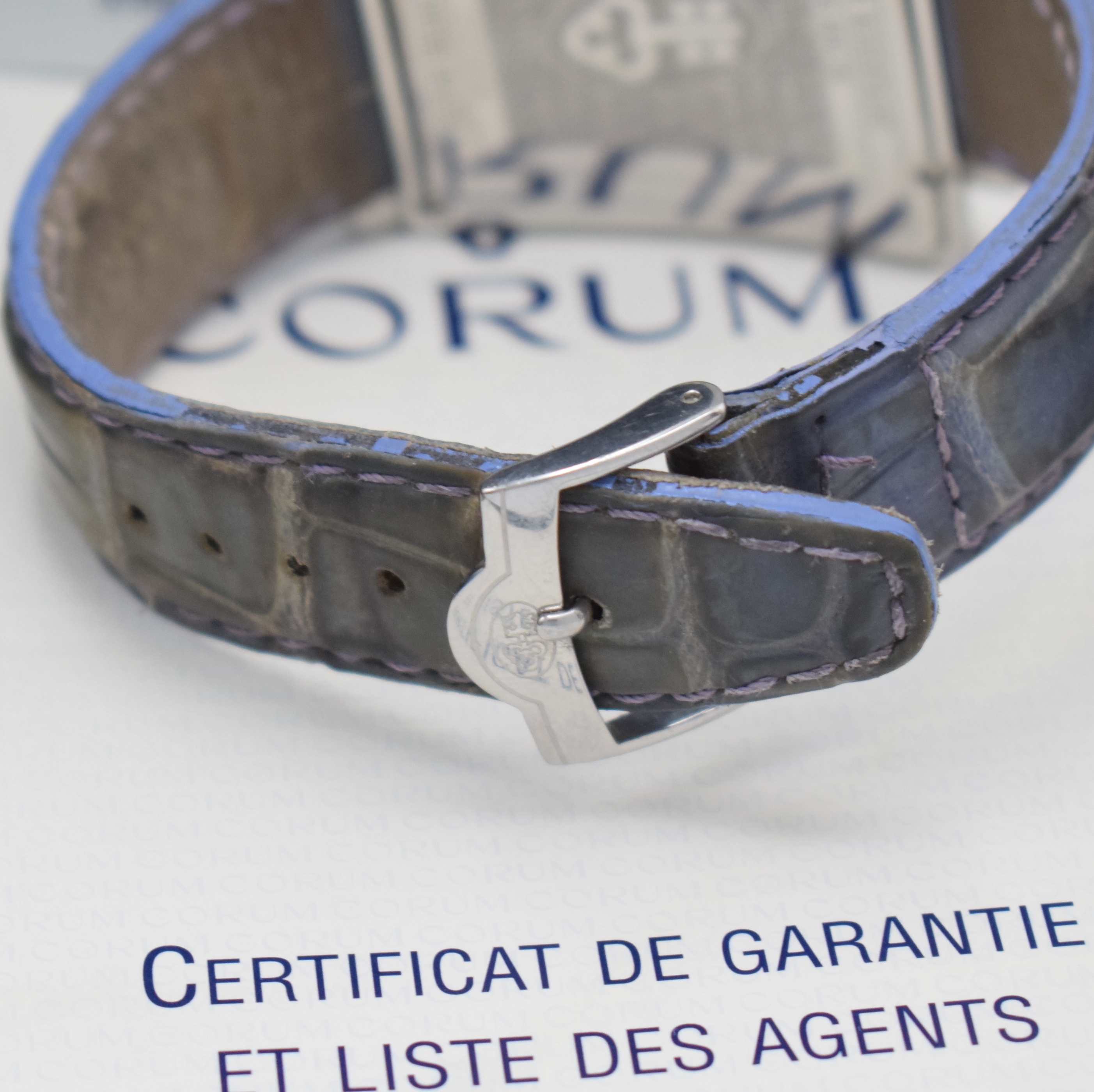 Detail b: CORUM Armbanduhr Trapeze Referenz 106.404.20, Schweiz um 2005, quarz, trapezförmiges Edelstahlgeh. inkl. orig. Lederband (zu ern.) m. orig. ...