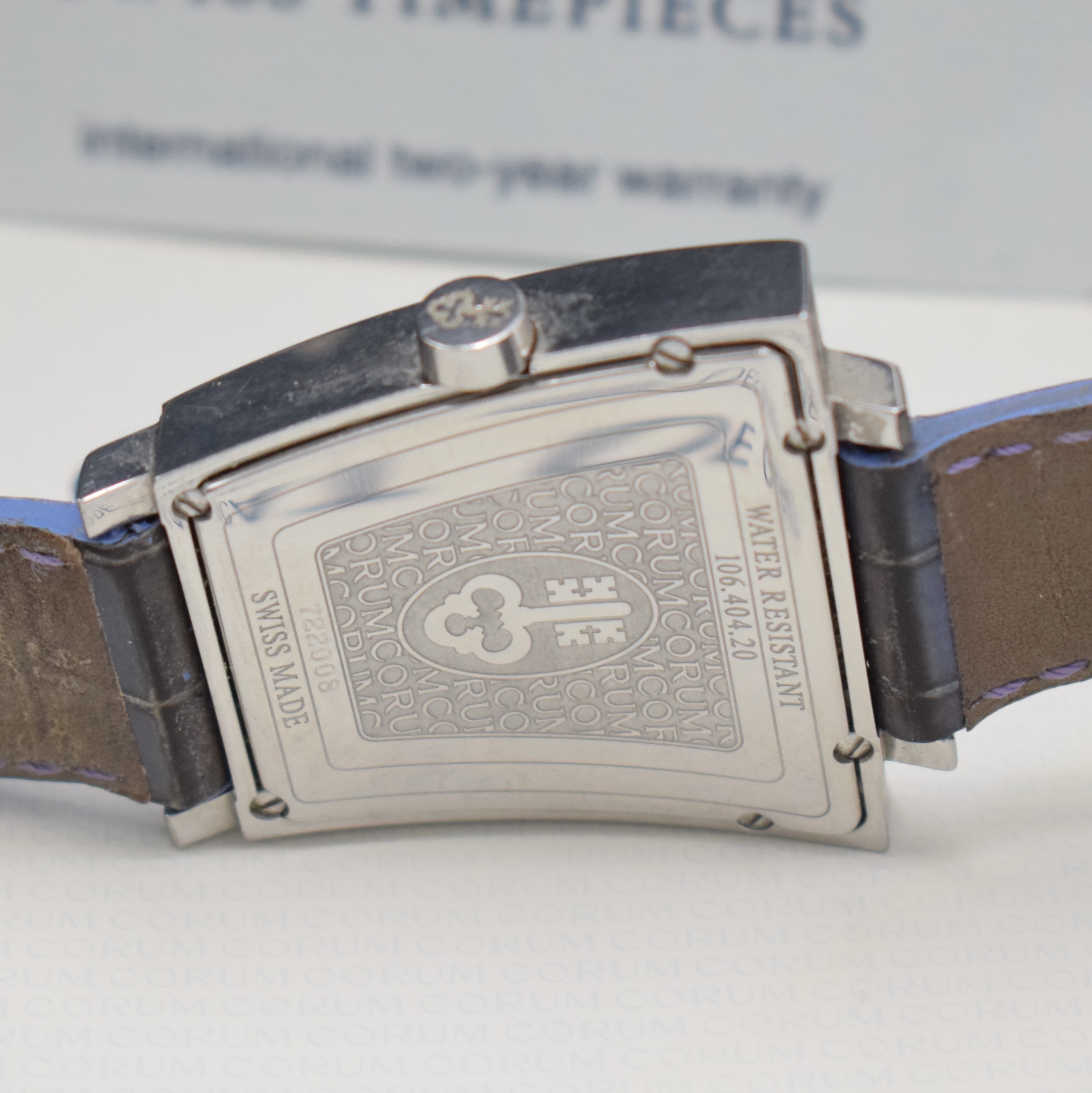 Detail d: CORUM Armbanduhr Trapeze Referenz 106.404.20, Schweiz um 2005, quarz, trapezförmiges Edelstahlgeh. inkl. orig. Lederband (zu ern.) m. orig. ...