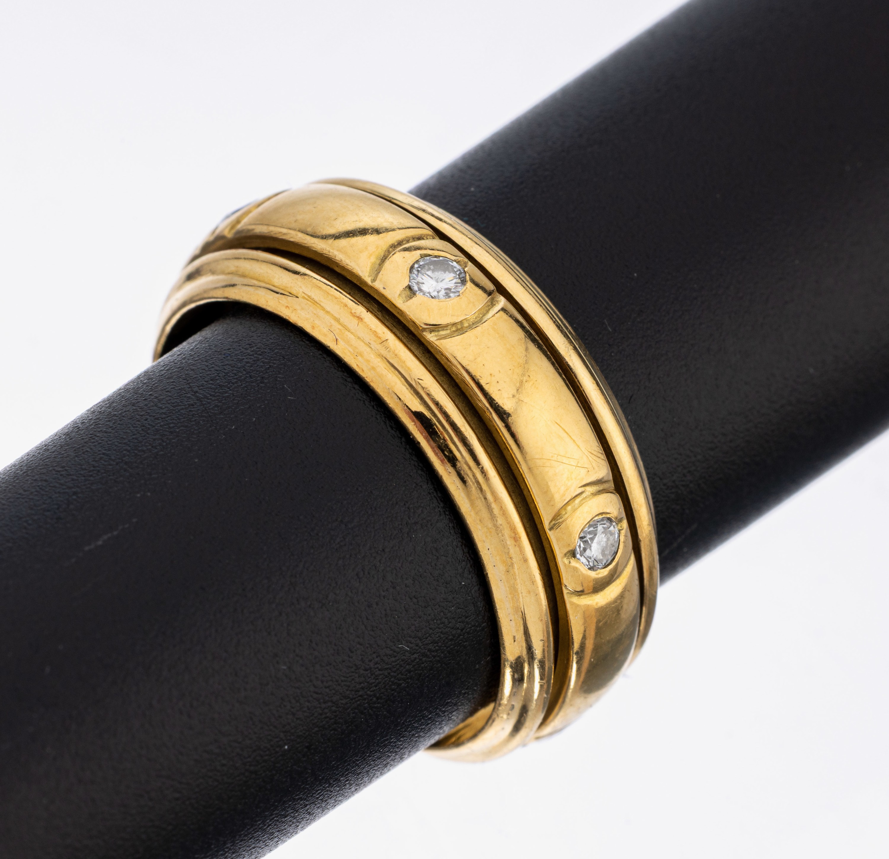 18 kt Gold Brillant-Ring, GG 750/000, mittlere Ringschiene drehbar, 6 Brillanten zus. ca. 0.30 ct Weiß/si-p, RW 66, ca. 13.4 g