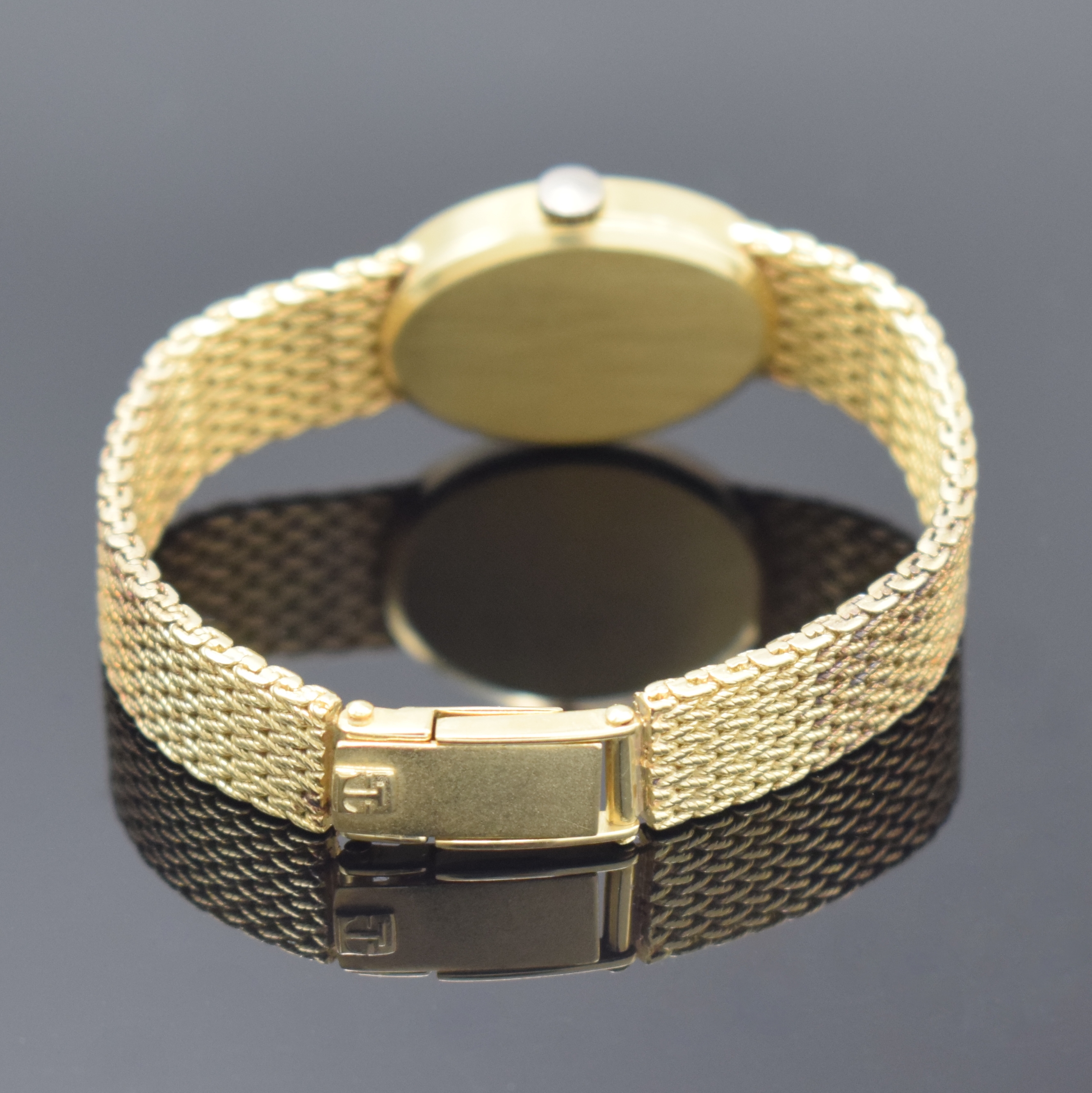 Detail b: TISSOT Damenarmbanduhr in GG 585/000, Handaufzug, Schweiz 1970er Jahre, Milanaiseband, Boden aufgedr., gold. Zifferbl. m. aufgel. Indizes altersbed. ...