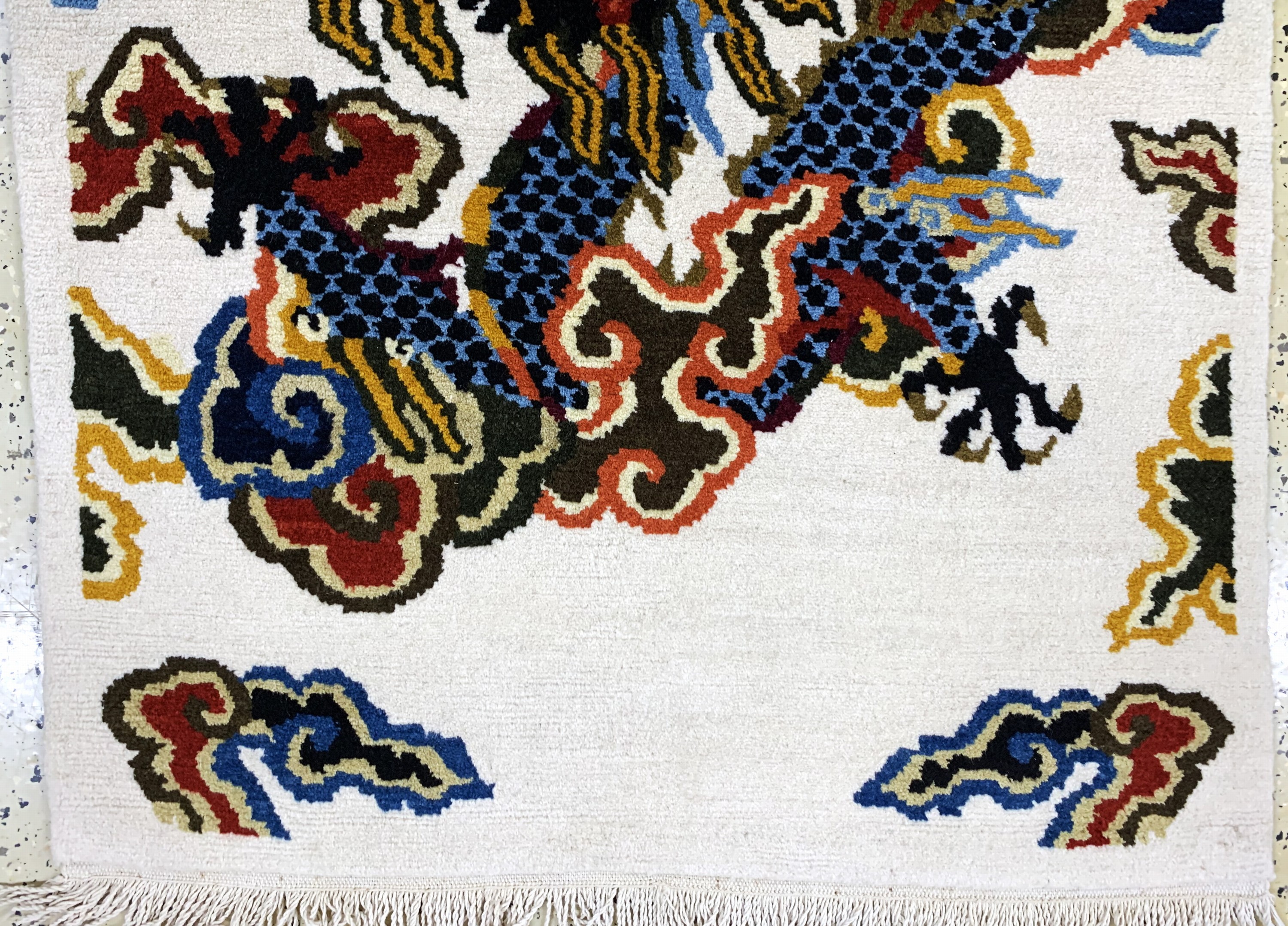 Detail b: "Drachen-Teppich", Nepal, Mitte 20.Jhd, Wolle auf Baumwolle, ca. 150 x 90 cm, EHZ:(nahezu neuwertig).