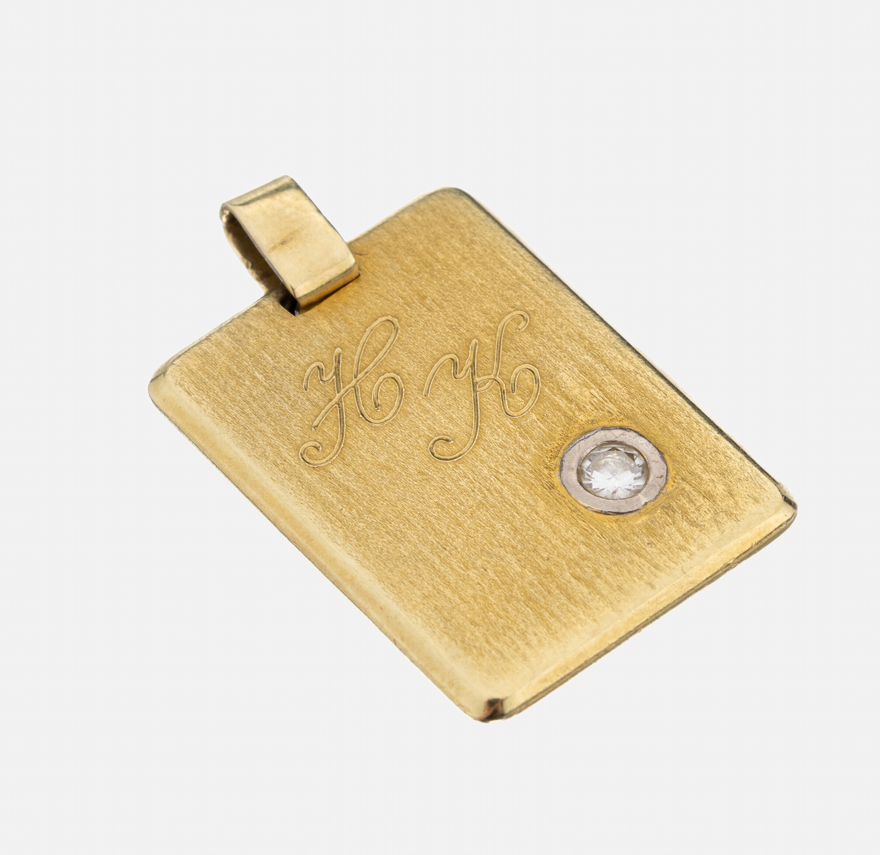 14 kt Gold Brillant-Anhänger, GG/WG 585/000, schlichte Platte mit abgerundeten Ecken, 1 in WG gefasster Brillant ca. 0.10 ct Weiß/si, Monogram HK, ...