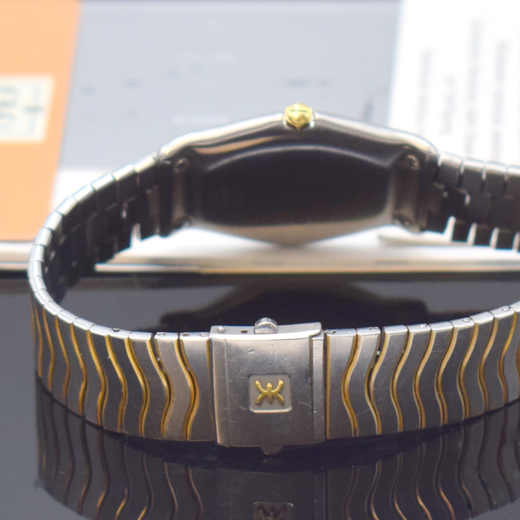 Detail b: EBEL Classic Wave Armbanduhr in Stahl/Gold Referenz 181903, Schweiz um 1990, quarz, 5- fach über Lünette verschr. Geh., orig. Wellenband, weißes ...