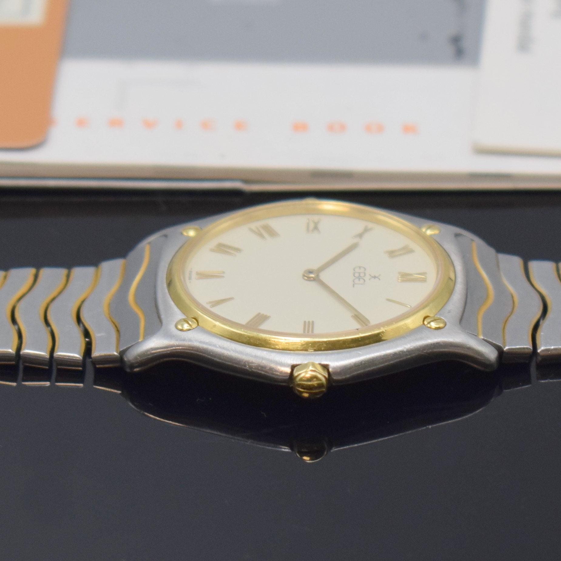 Detail c: EBEL Classic Wave Armbanduhr in Stahl/Gold Referenz 181903, Schweiz um 1990, quarz, 5- fach über Lünette verschr. Geh., orig. Wellenband, weißes ...