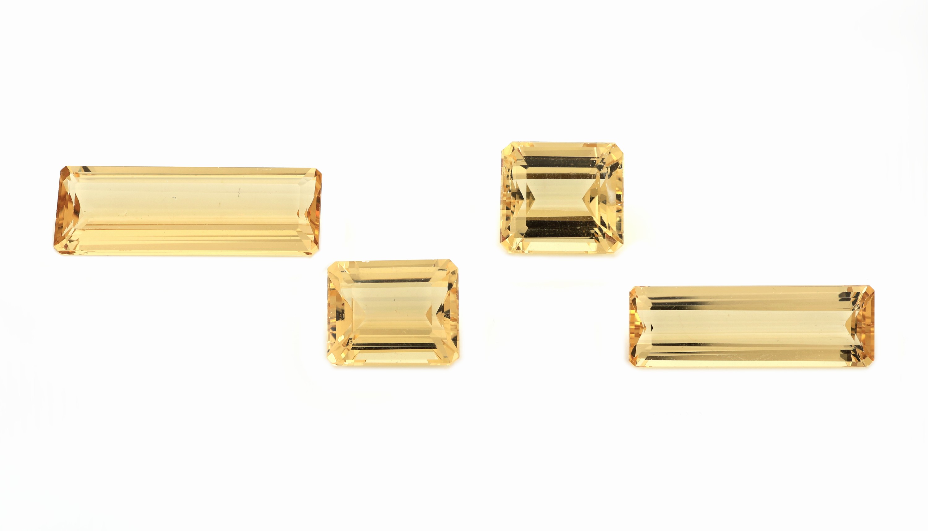 Lot 4 lose facett. Goldberylle, zus. 26.55 ct,in versch. Schliffformen