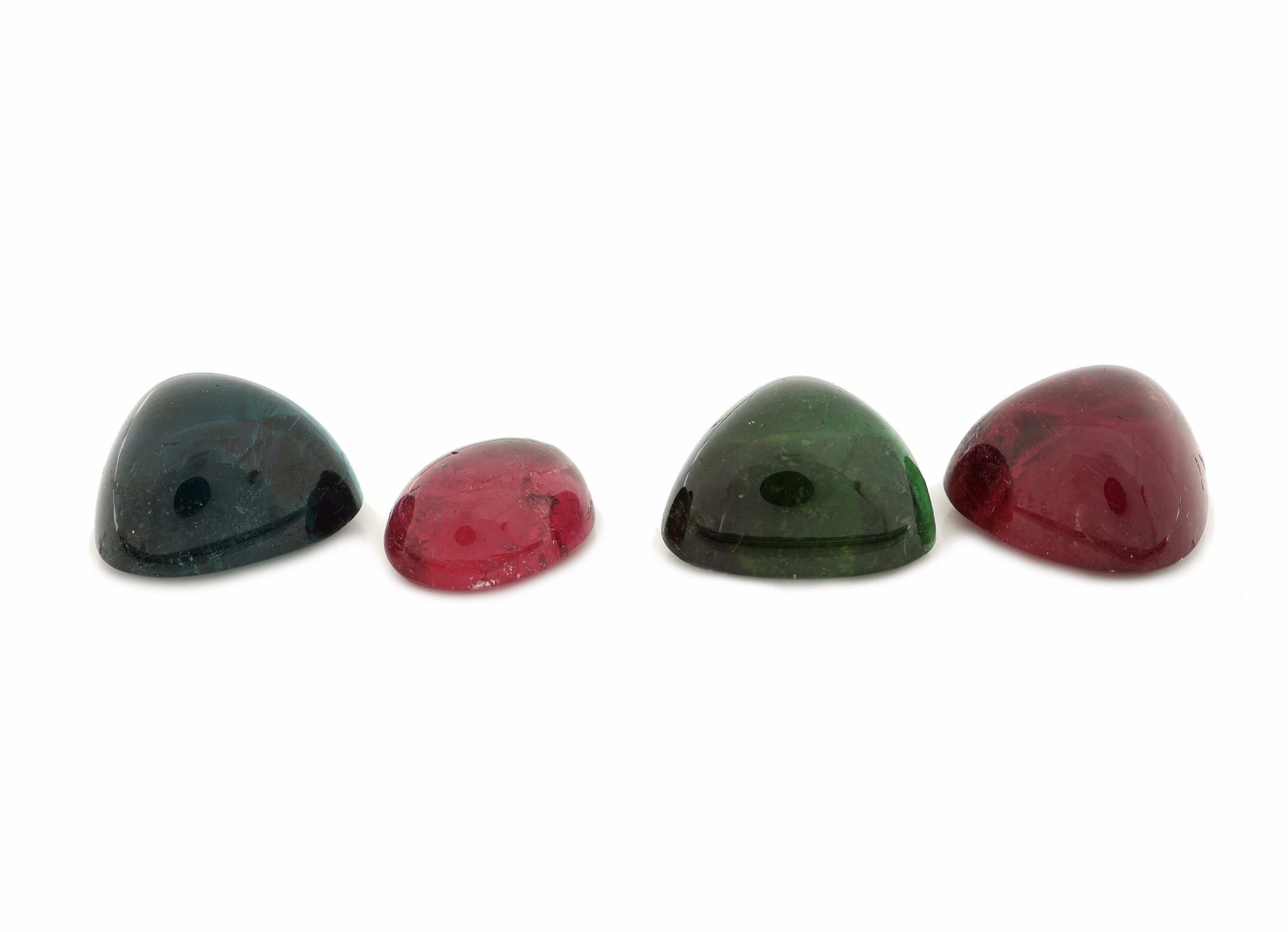 Detail b: Lot 4 lose Turmalin-Cabochons, zus. 40.92 ct, in versch. Formen, Farben und Größen