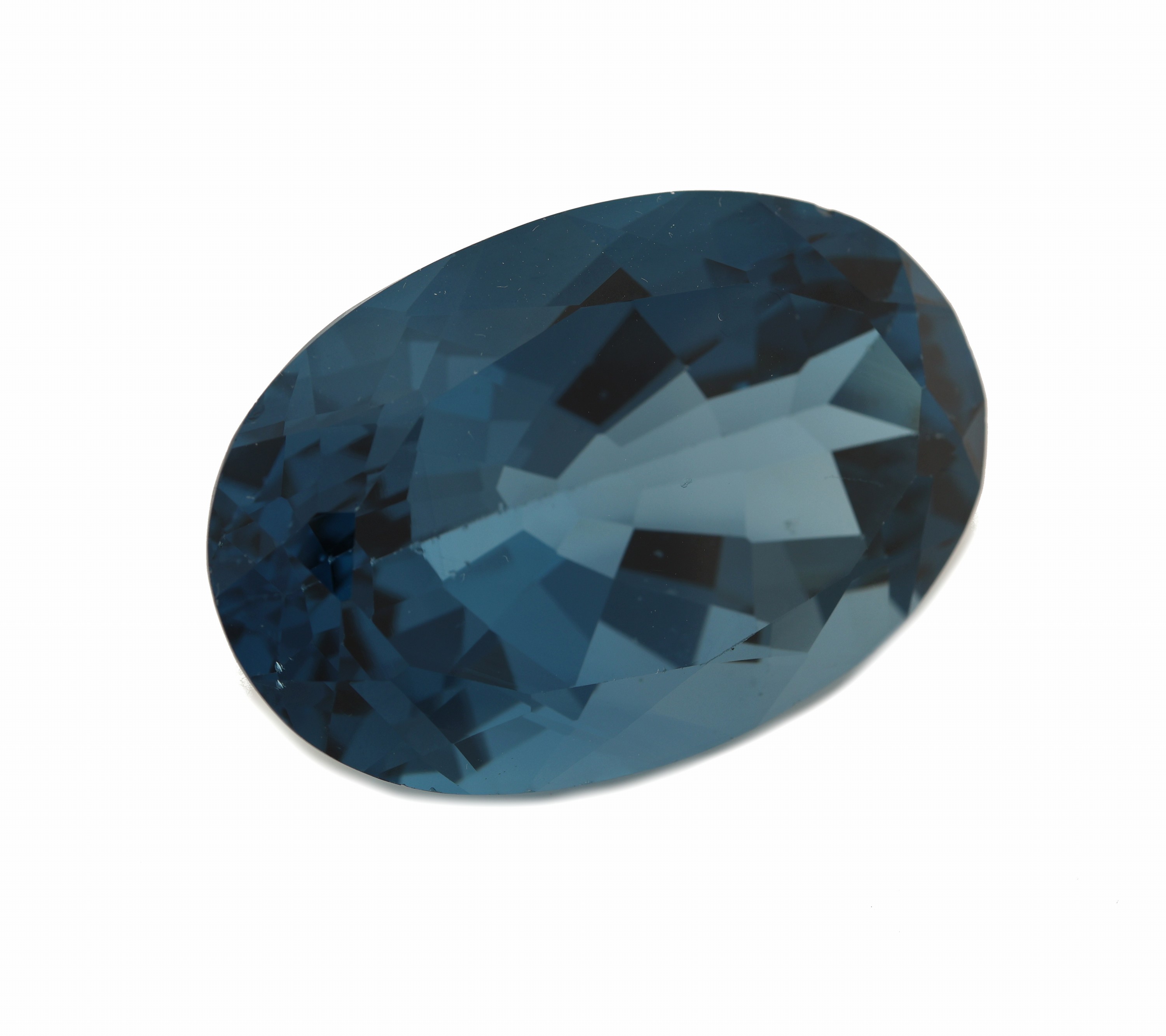 Detail a: Loser ovalfacett. petrolfarb. Blautopas (beh.), 181.35 ct, gewogen, ca. 4.5 x 2.8 x 2 cm, ca. 36.27 g