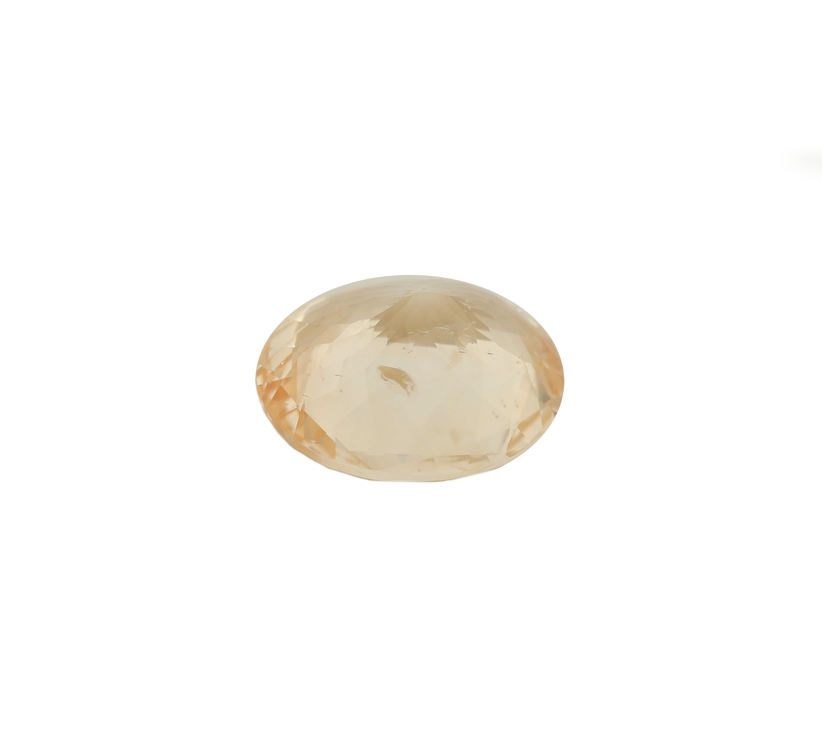 Detail b: Loser ovalfacett. gelber Saphir, 4.73 ct, 11.36 x 9.40 x 5.62 mm, mit Expertise