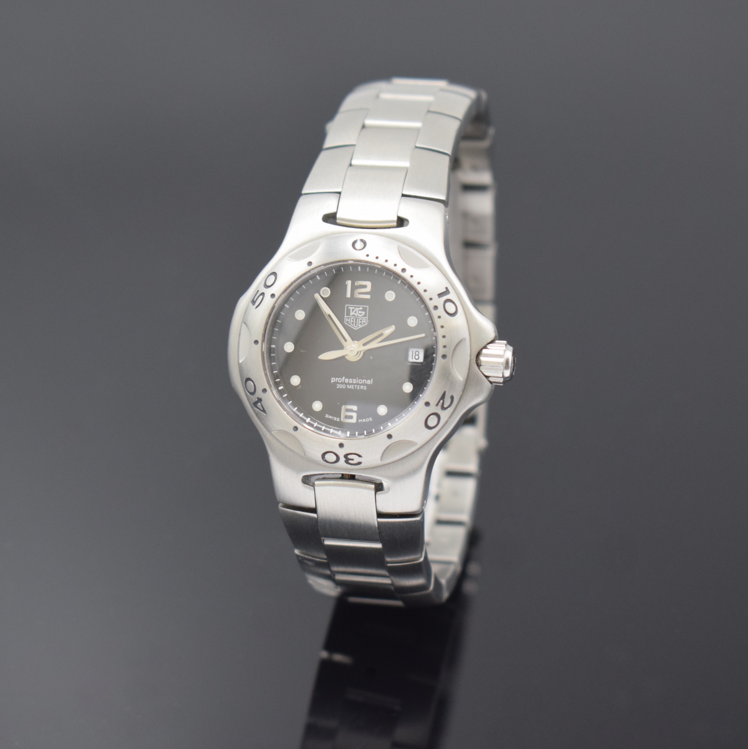 TAG HEUER Kirium Damenarmbanduhr Referenz WL131D, Schweiz um 2005, quarz, Boden und Krone verschr., orig. Stahlband m. Faltschl., Lünette eins. ...