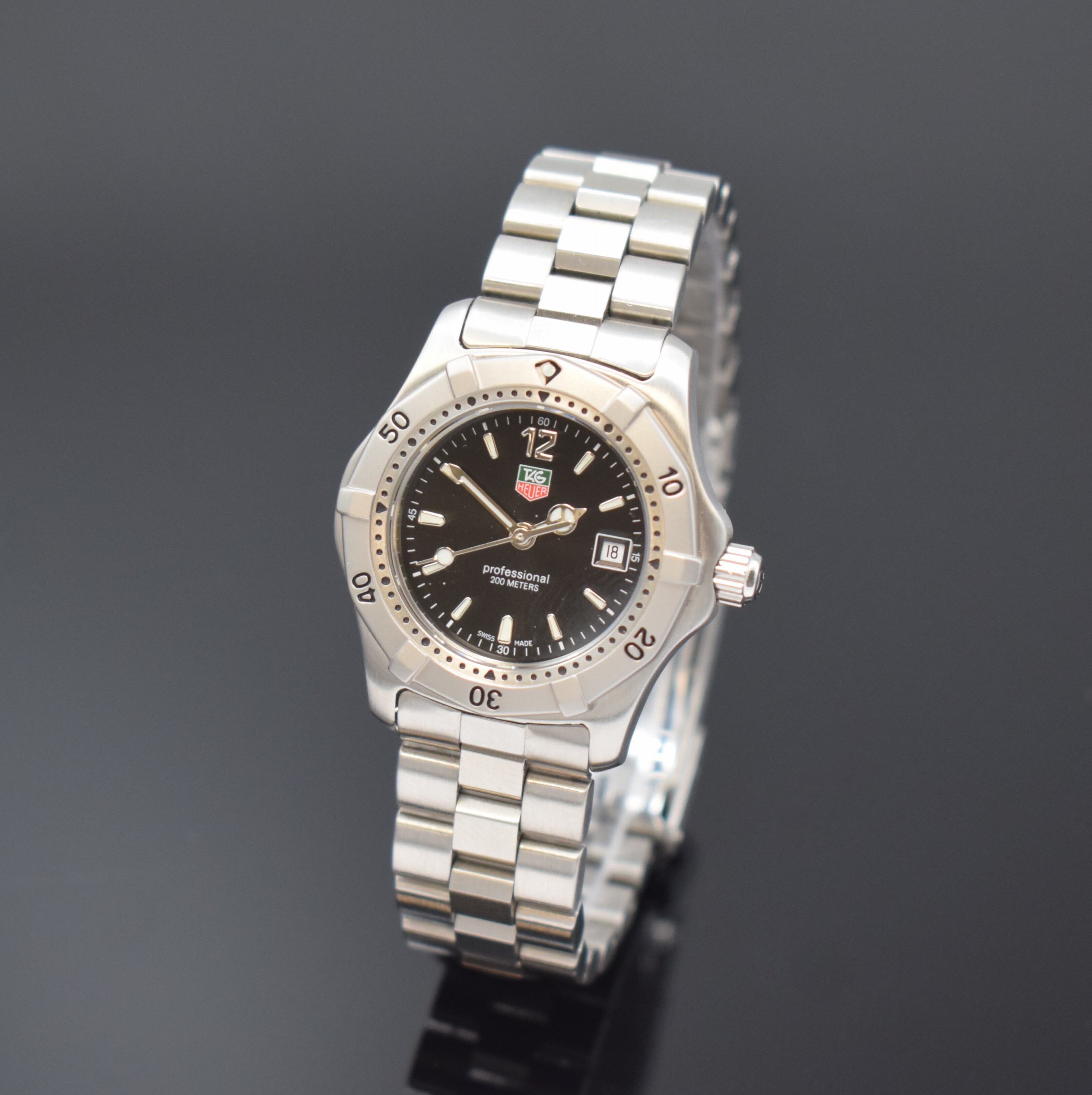 TAG HEUER Damenarmbanduhr Referenz WK1310-0,Schweiz um 1995, quarz, Boden u. Krone verschr., orig. Stahlband m. Faltschl., Lünette eins. drehb., ...