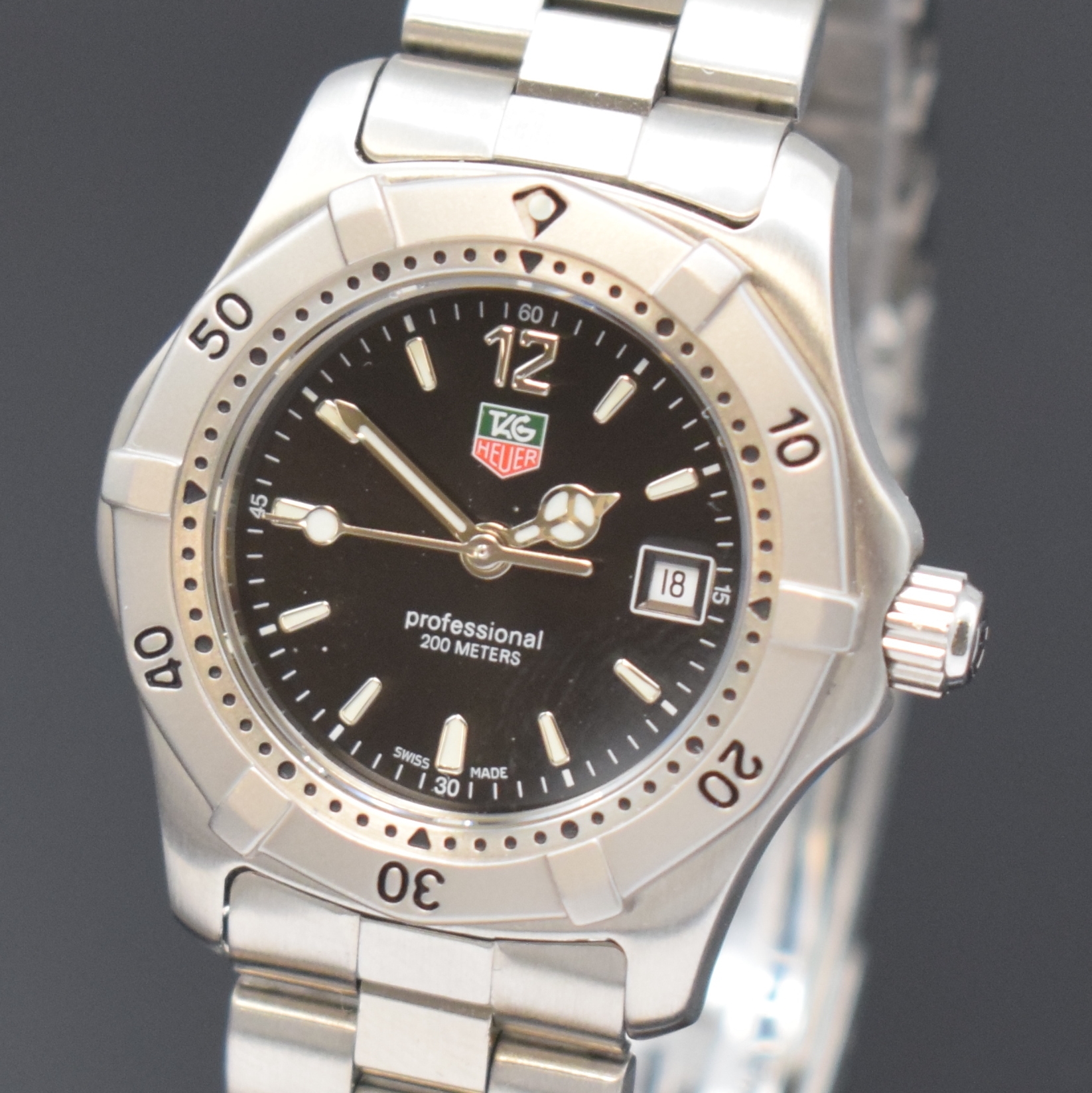 Detail a: TAG HEUER Damenarmbanduhr Referenz WK1310-0,Schweiz um 1995, quarz, Boden u. Krone verschr., orig. Stahlband m. Faltschl., Lünette eins. drehb., ...