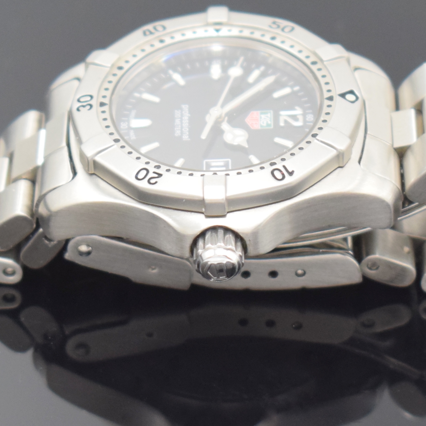 Detail c: TAG HEUER Damenarmbanduhr Referenz WK1310-0,Schweiz um 1995, quarz, Boden u. Krone verschr., orig. Stahlband m. Faltschl., Lünette eins. drehb., ...