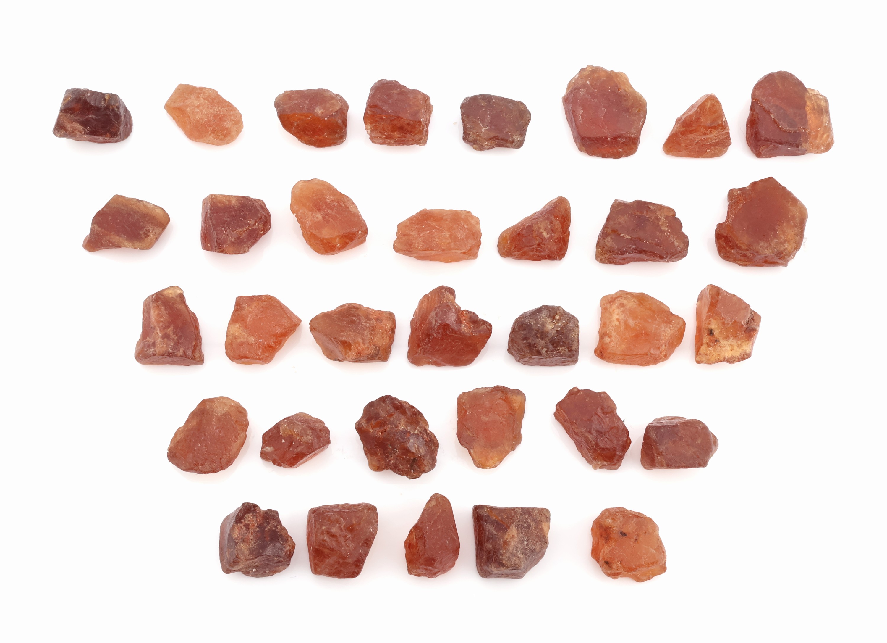 Lot lose Hessonit-Rohsteine zus. ca. 376.6 ct (gewogen), in versch. Größen, Formen und Farbnuancen