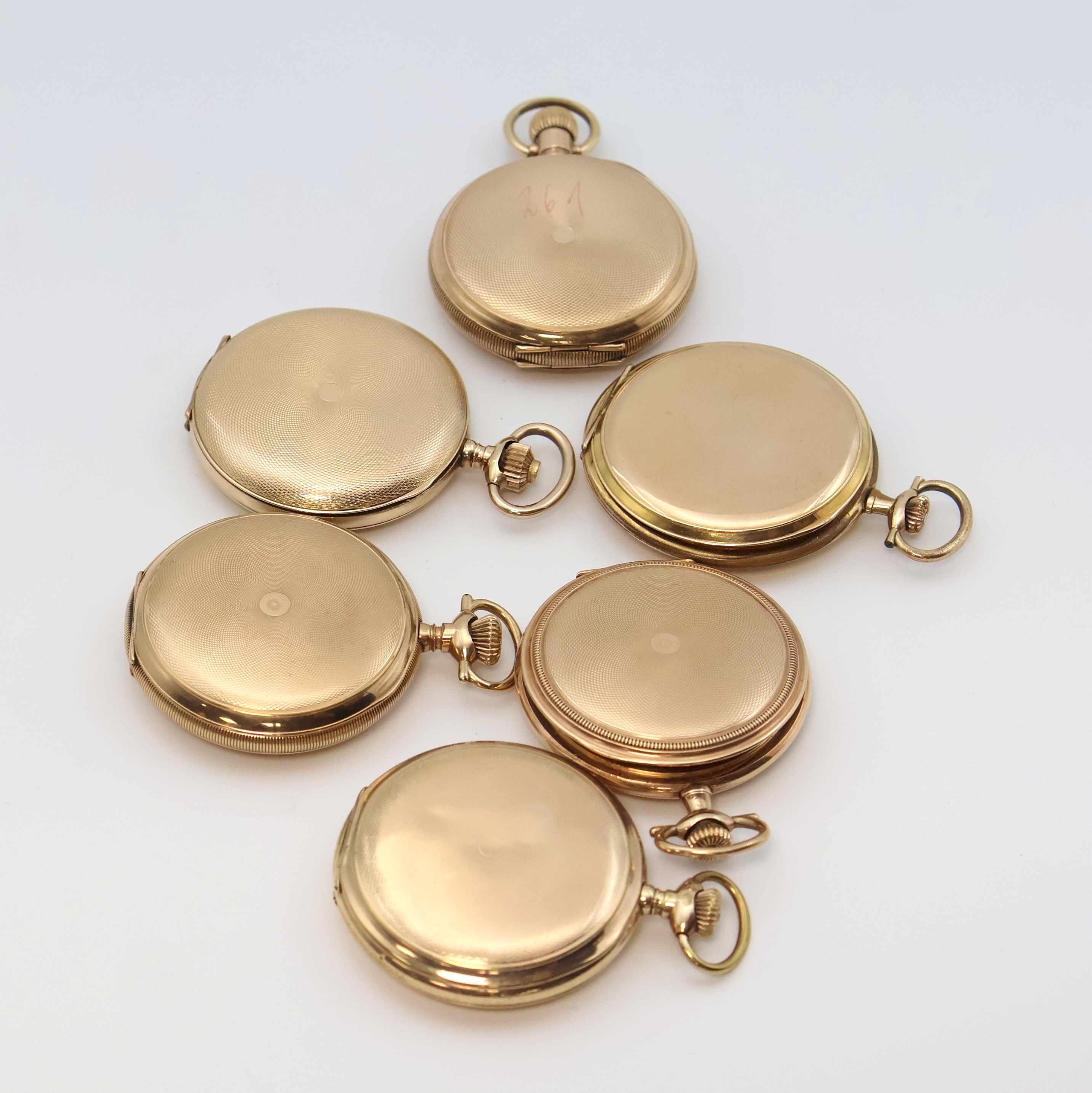 Detail d: Konvolut: 6 vergoldete Savonette Taschenuhren für den amerikanischen Markt, USA/Schweiz um 1920, meist guill. Geh. berieb., Emailzifferblätter ...