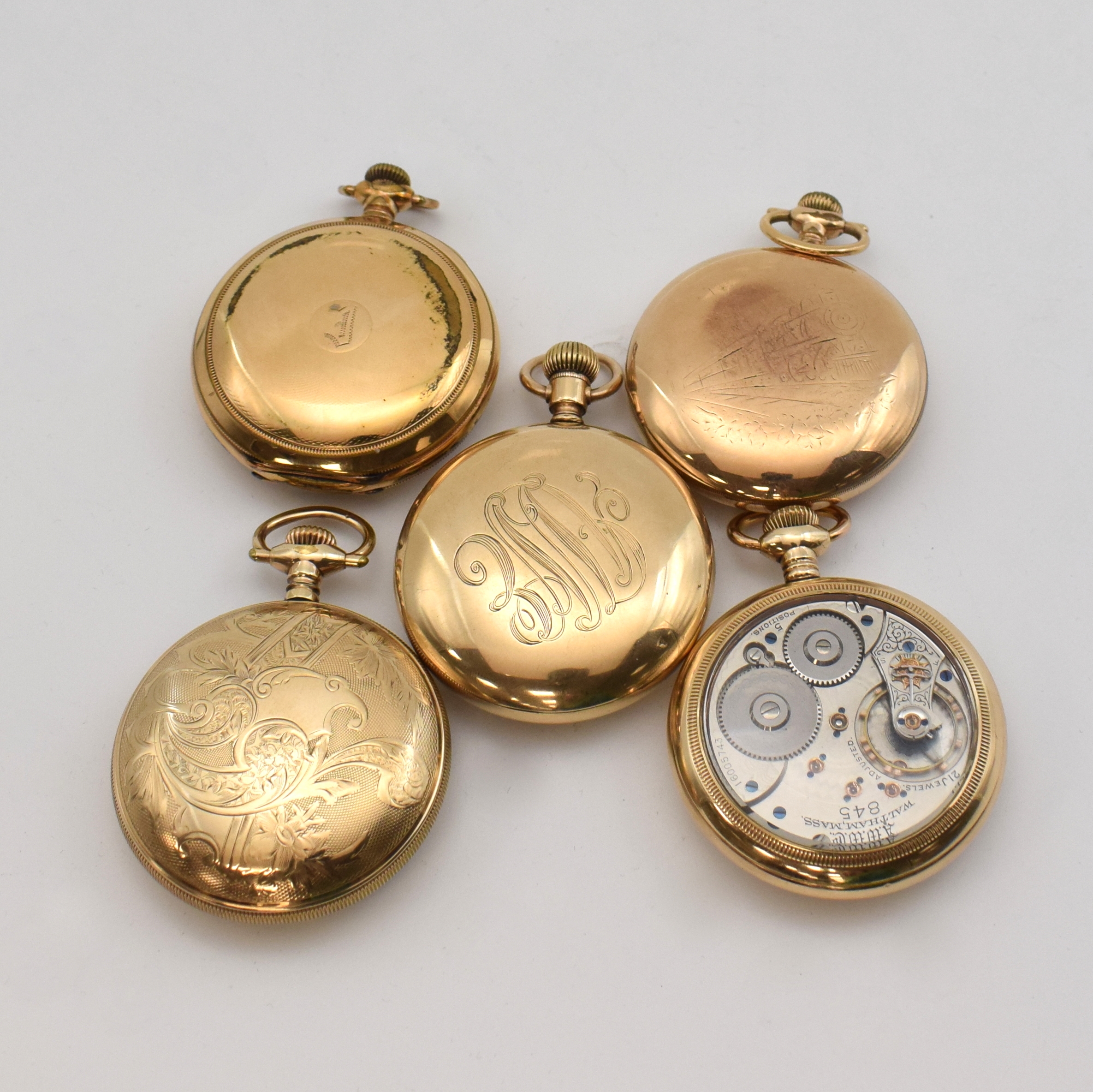 Detail c: Konvolut 5 offene amerikanische Taschenuhren, USA um 1900, verg. Geh. teilw. dell., davon 4 x verschr., Emailzifferbl. 4 x m. arab. und 1 x m. röm. ...