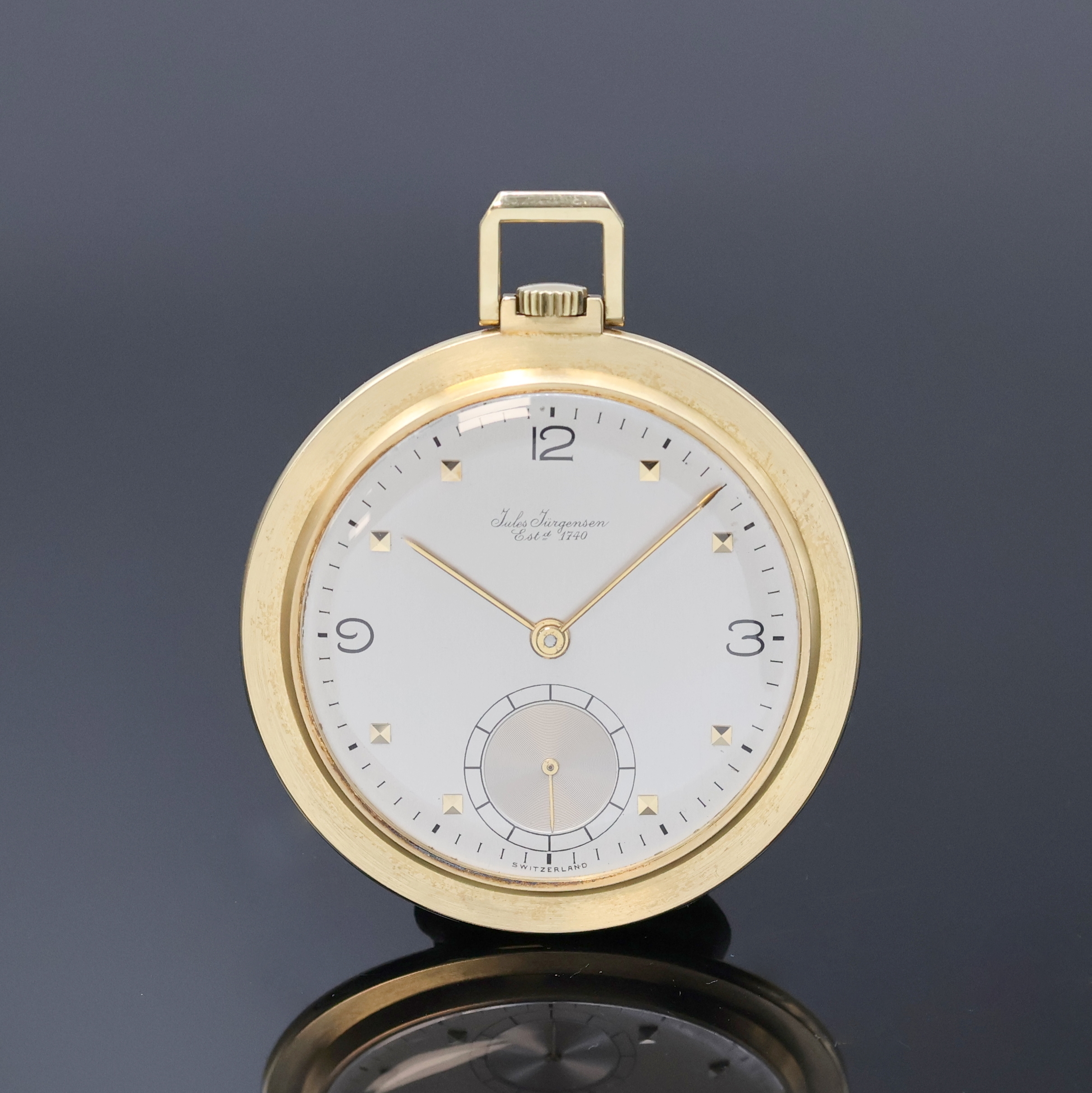 JULES JÜRGENSEN schöne Frackuhr in GG 585/000, Schweiz um 1940, Handaufzug, dell. Boden aufgedr., silb. Zifferbl. m. gold. Std.-Ind. u. emaill. ...