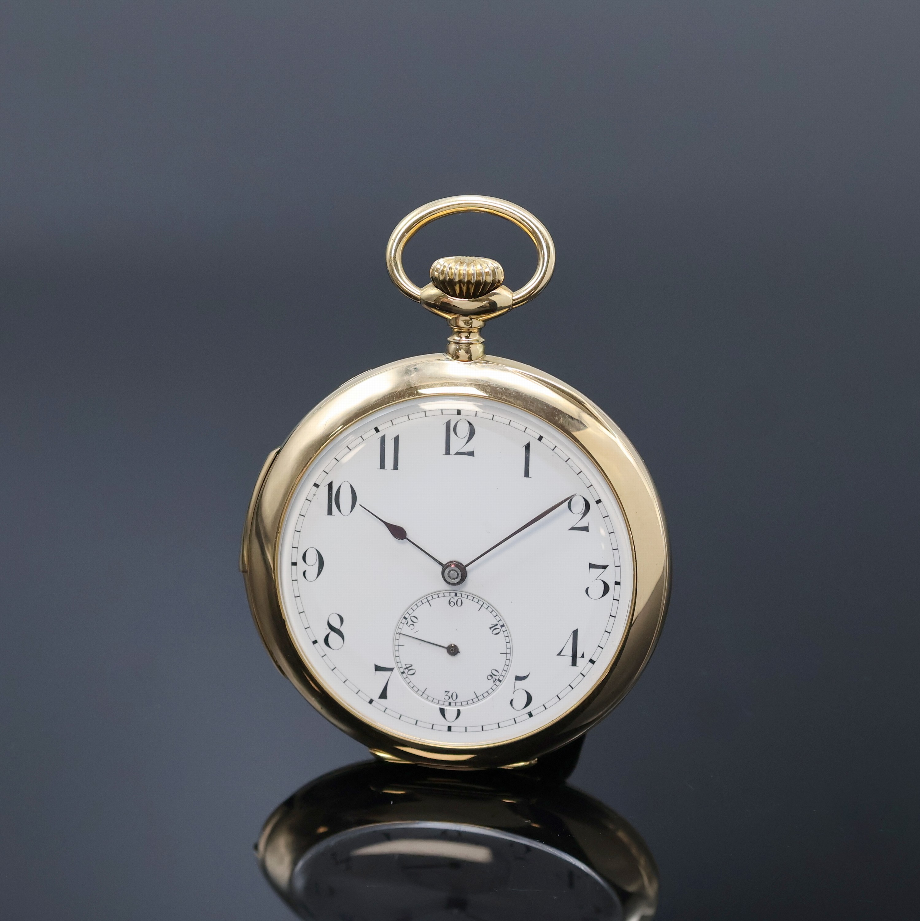 Offene Herrentaschenuhr mit Repetition in GG 750/000, Schweiz um 1910, glattes Geh., Goldcuvette, Emailzifferbl. m. arab. Zahlen, gebl. Zeiger, kl. ...