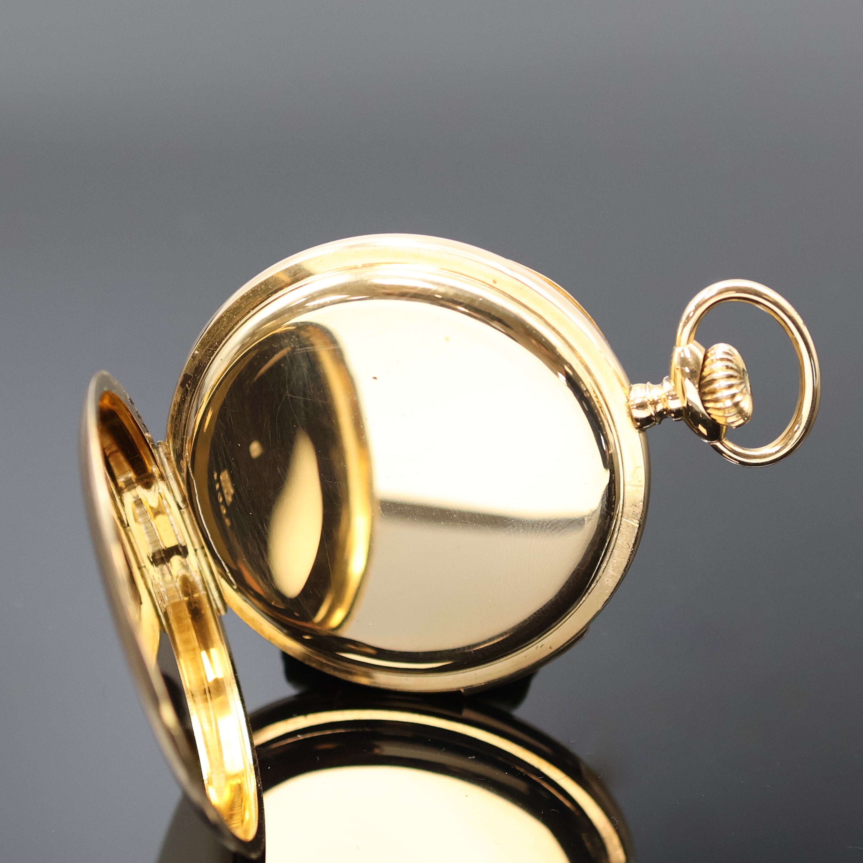 Detail c: Offene Herrentaschenuhr mit Repetition in GG 750/000, Schweiz um 1910, glattes Geh., Goldcuvette, Emailzifferbl. m. arab. Zahlen, gebl. Zeiger, kl. ...