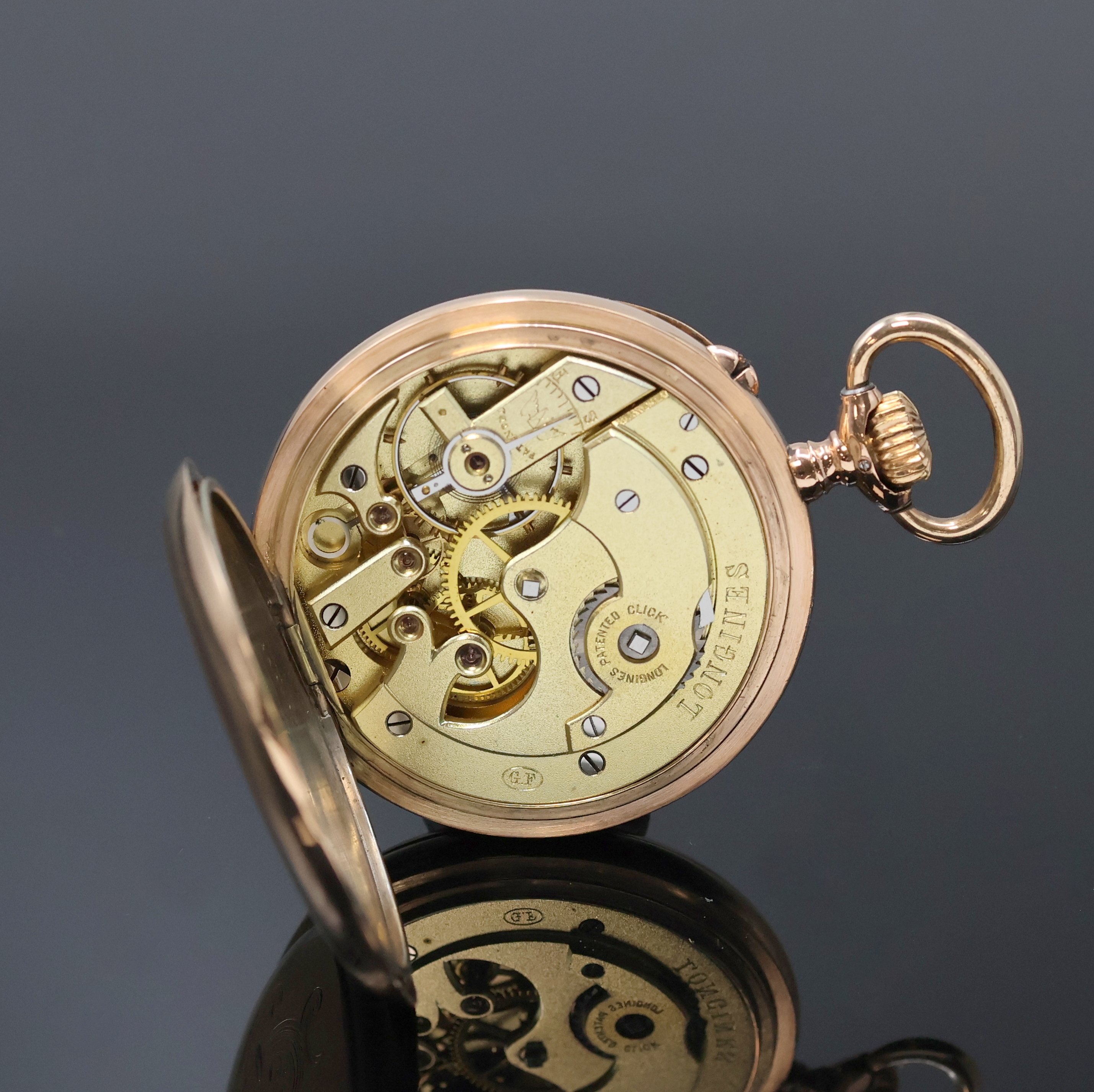 Detail e: LONGINES frühe offene Herrentaschenuhr in RG 585/000, Schweiz um 1900, glattes Geh., Rückdeckel m. Monogramm, Metallcuvette m. Medaillengravur, ...