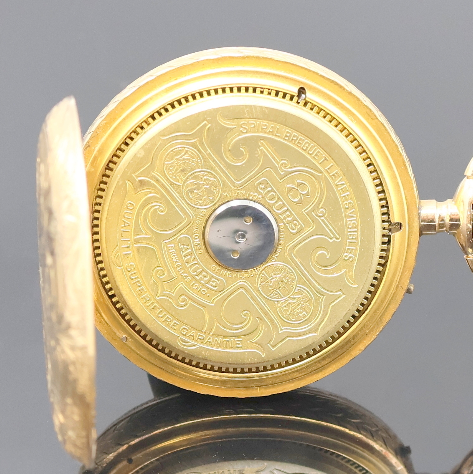 Detail c: HEBDOMAS seltene 8-Tage-Savonette in GG 585/000, Schweiz um 1915, floral grav. Geh., 3/4-Emailzifferbl., darunter sichtbare Unruh, arab. Zahlen, ...