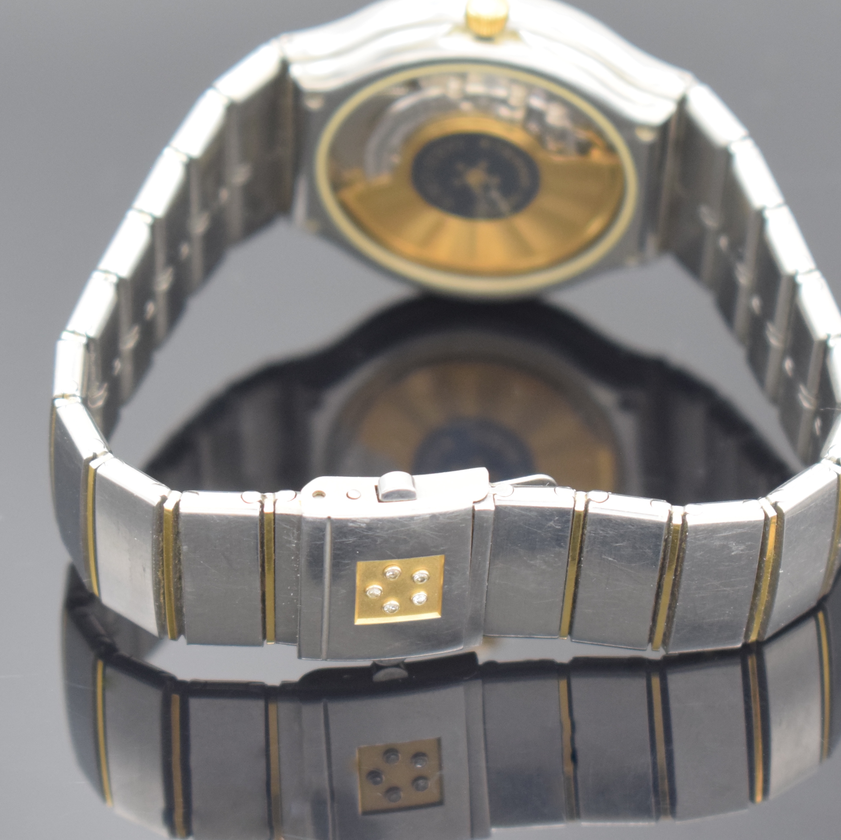 Detail b: ETERNA-MATIC Gold-Club Armbanduhr in Stahl/ Gold, Schweiz um 1990, Automatik, beids. vergl. Geh., Goldlünette m. blauen Einlagen, integr. ...