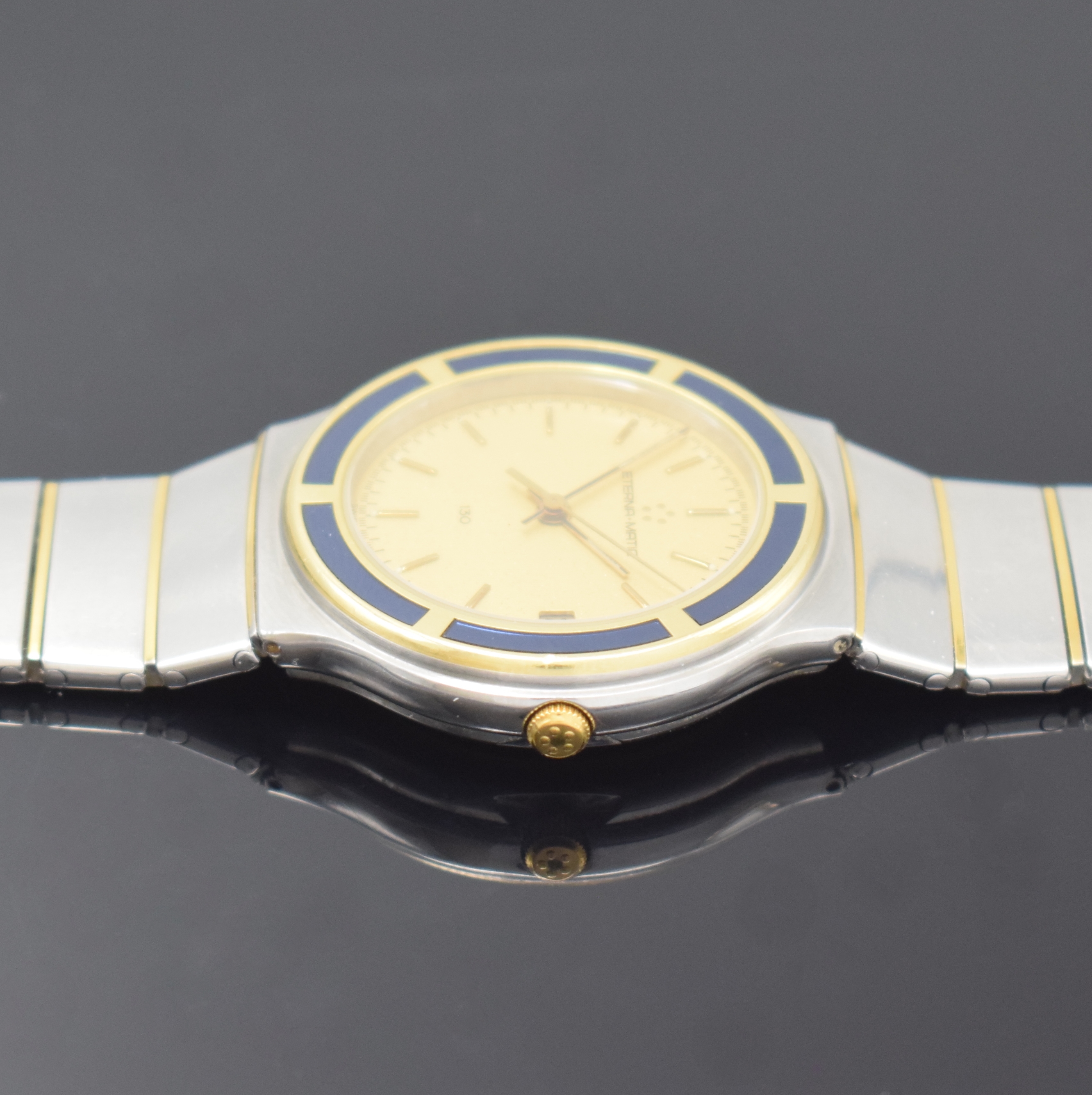 Detail c: ETERNA-MATIC Gold-Club Armbanduhr in Stahl/ Gold, Schweiz um 1990, Automatik, beids. vergl. Geh., Goldlünette m. blauen Einlagen, integr. ...