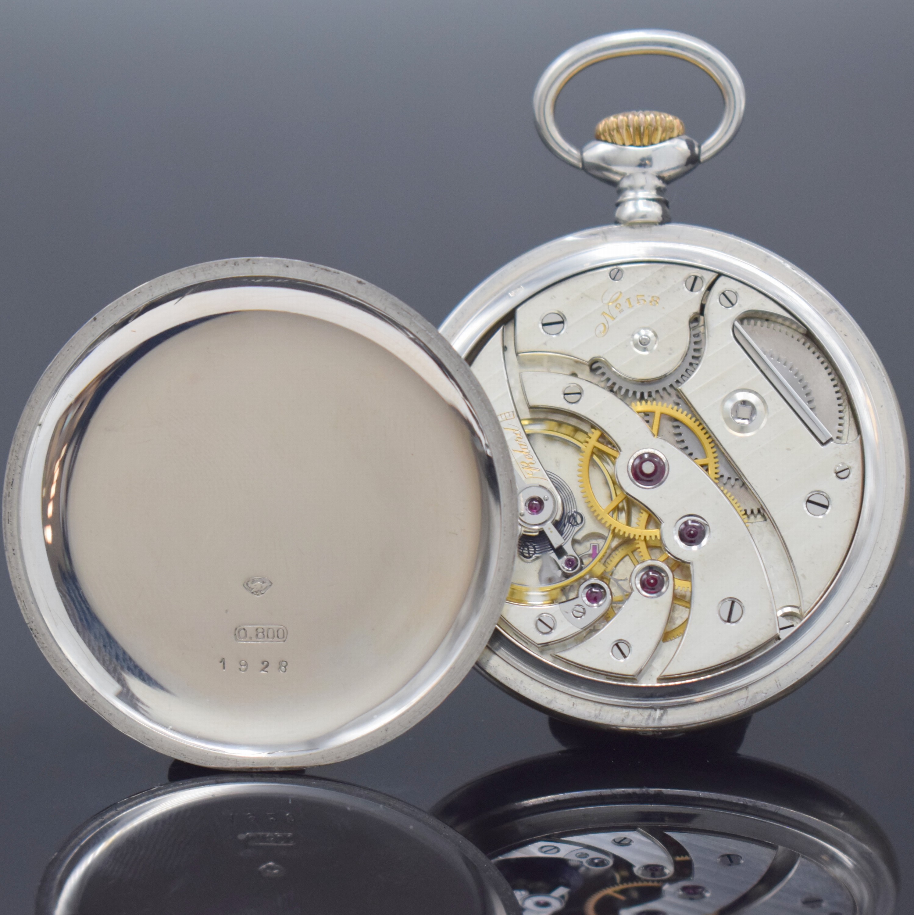 Detail b: UHRMACHERSCHULE St. Imier offene Silbertaschenuhr, Schweiz um 1928, glattes Geh., Boden und Glasrand aufgedr., 2-teil. Rähmchen-Emailzifferbl. m. ...