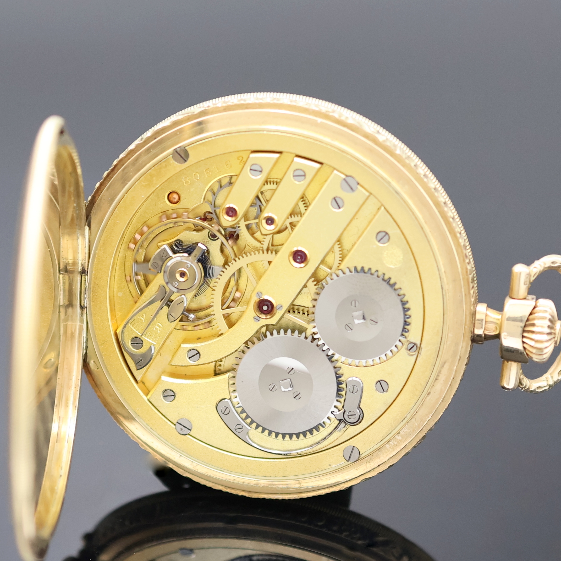 Detail g: IWC Savonette-Frackuhr in GG 585/000 mit Kaliber 74, Schweiz um 1924, floral grav. 3-Deckel Goldgeh. l. dell., Sprung- u. Rückdeckel guill., ...