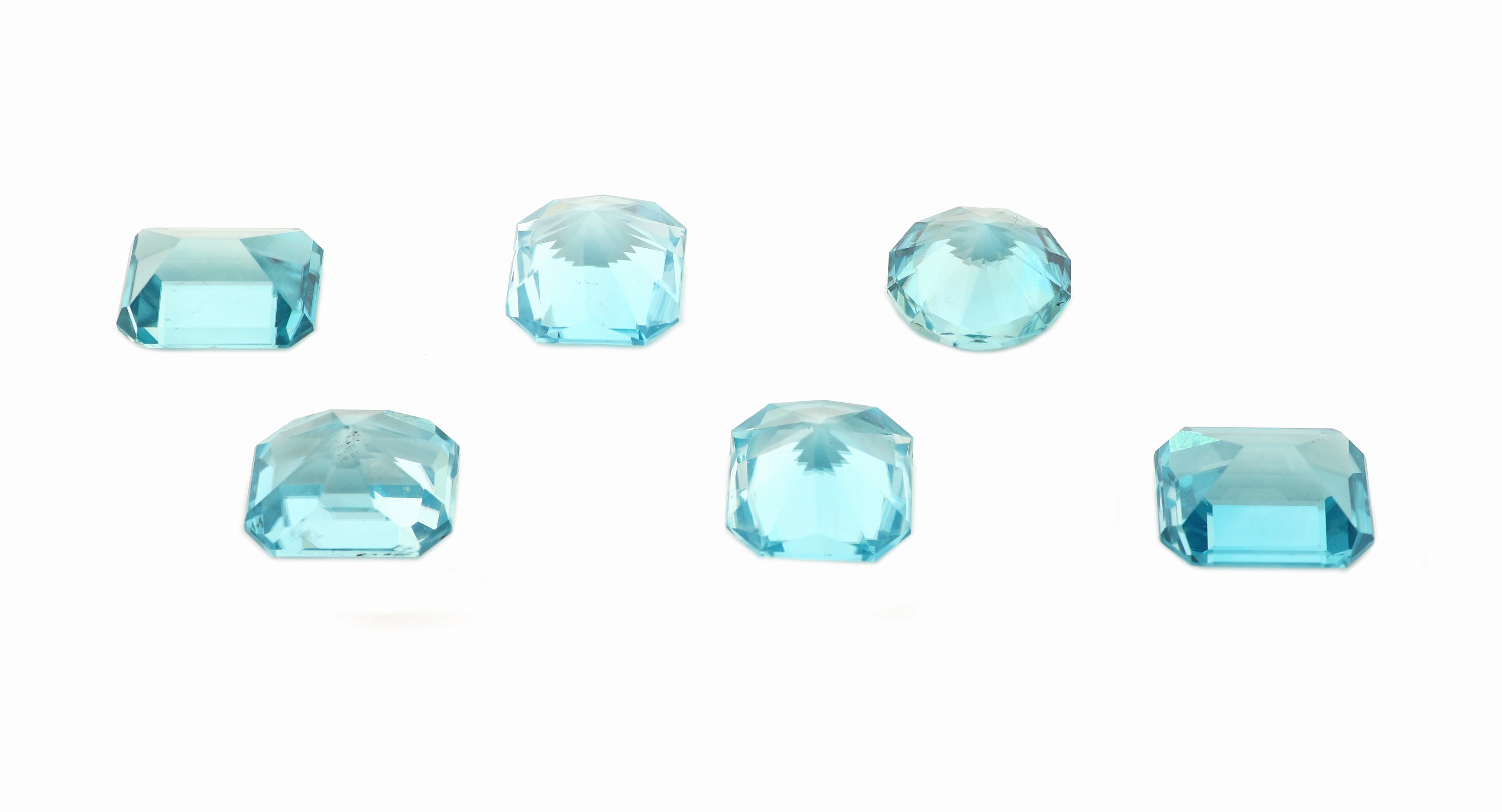 Detail a: Lot 6 türkis-blaue lose Zirkone, zus. ca. 11.04 ct, versch. Schliffformen und Größen
