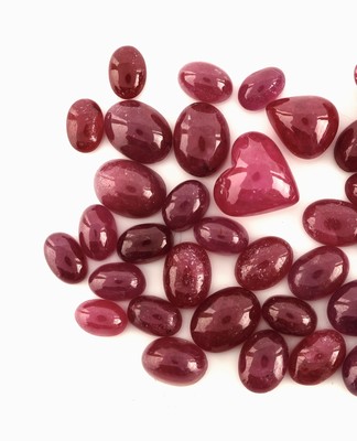 26918877a - Lot lose Rubin-Cabochons, zus. ca. 63.92 ct, versch. Größen und Formen ...
